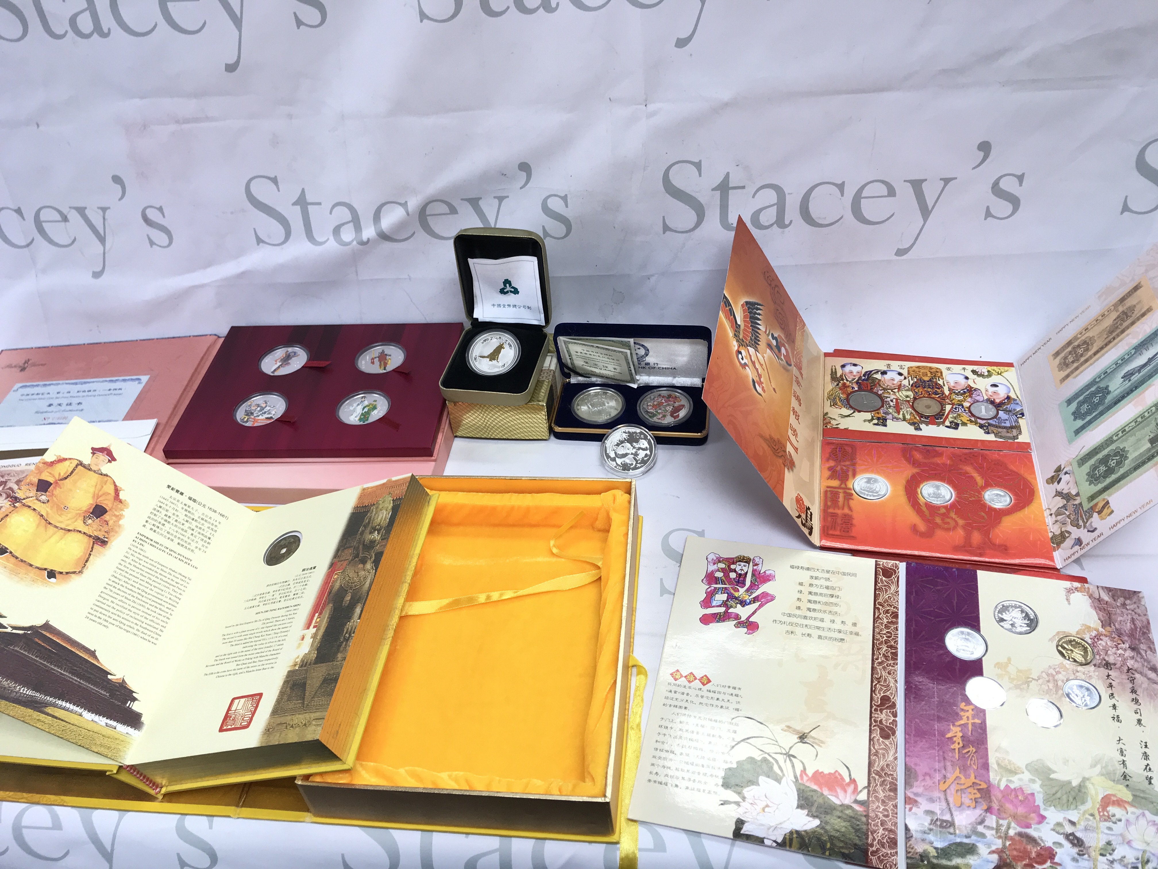 A collection of Chinese coinage including a number of silver 1 oz coins and Qing Dynasty coins. Postage B
