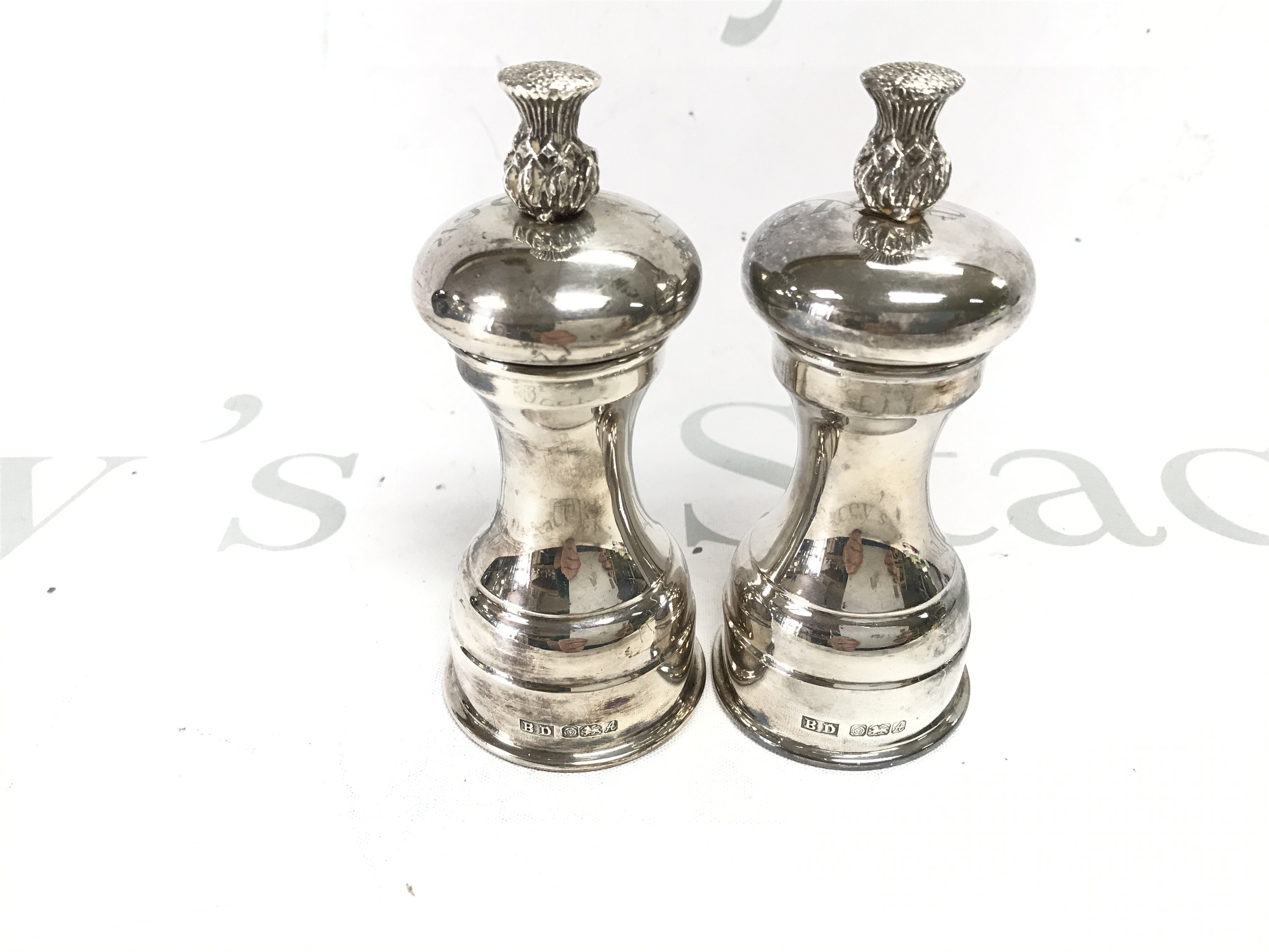 Two silver Sheffield hallmarked mills. Approx 350g. Postage B