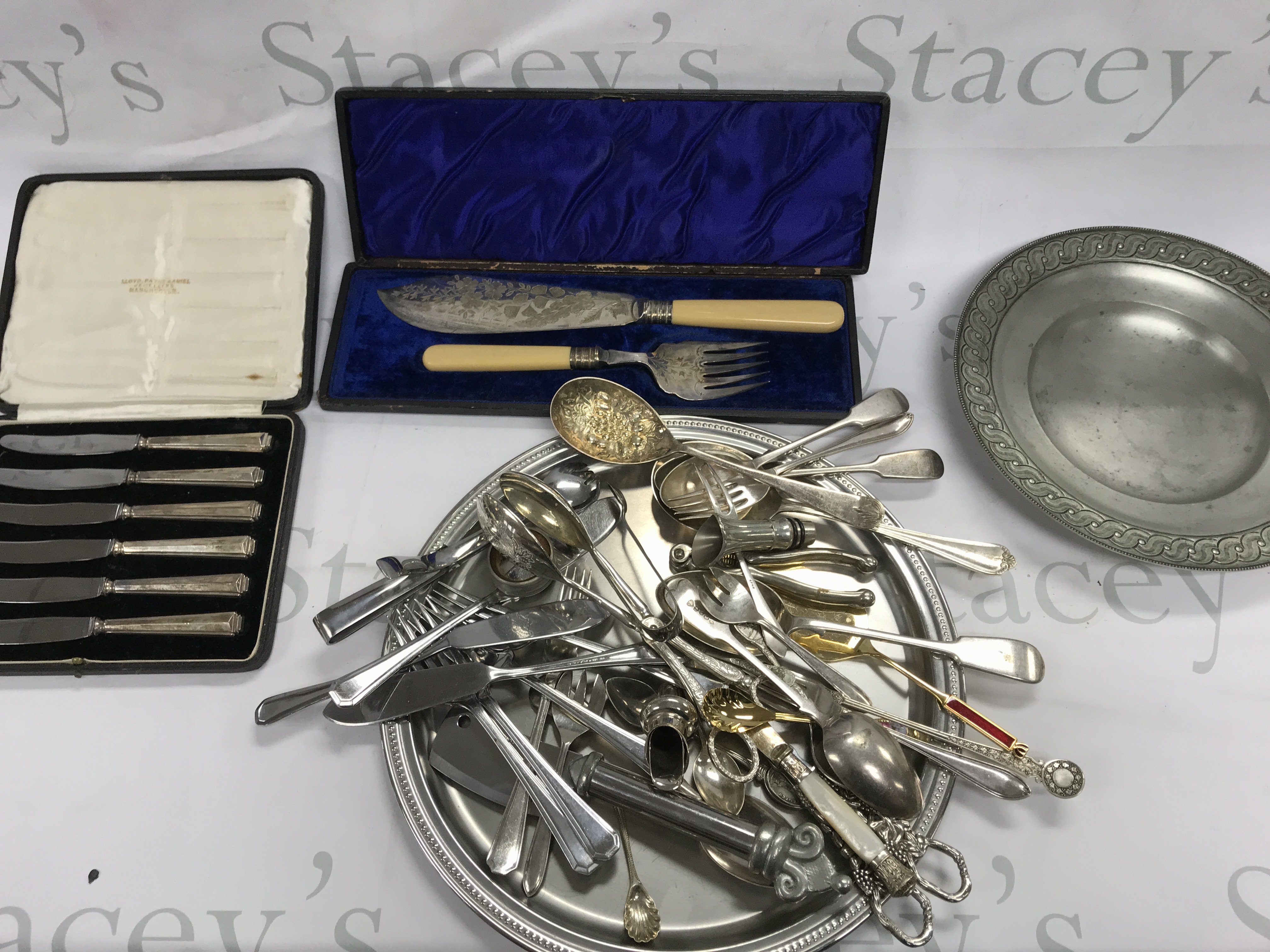 A collection of silver plate and other items including cutlery cased sets etc Postage B