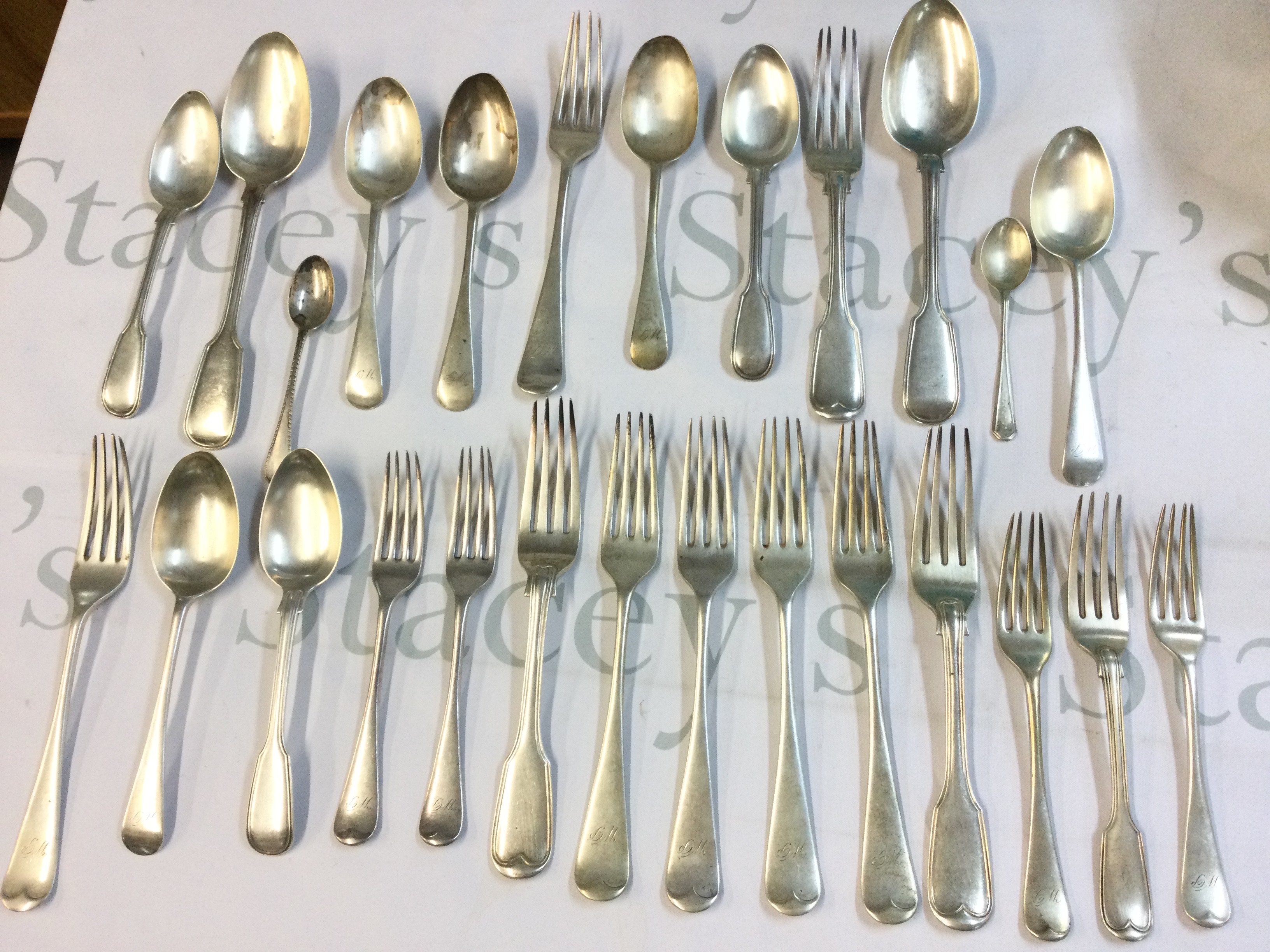 A collection of silver hallmarked cutlery including forks and spoons. Total weight 1.5kg approximately. Postage category B