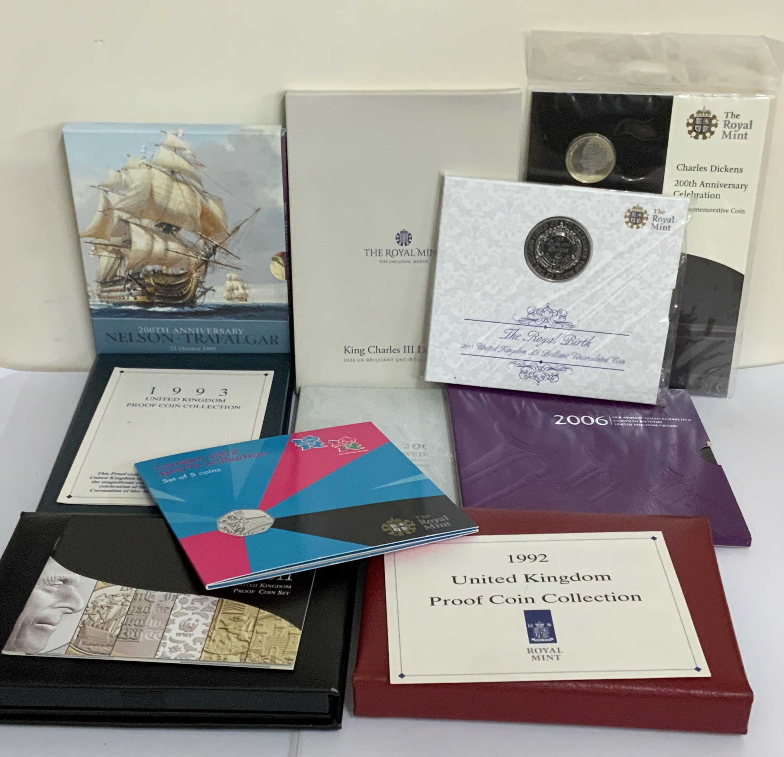 Royal Mint proof and uncirculated coin issue sets. (B)