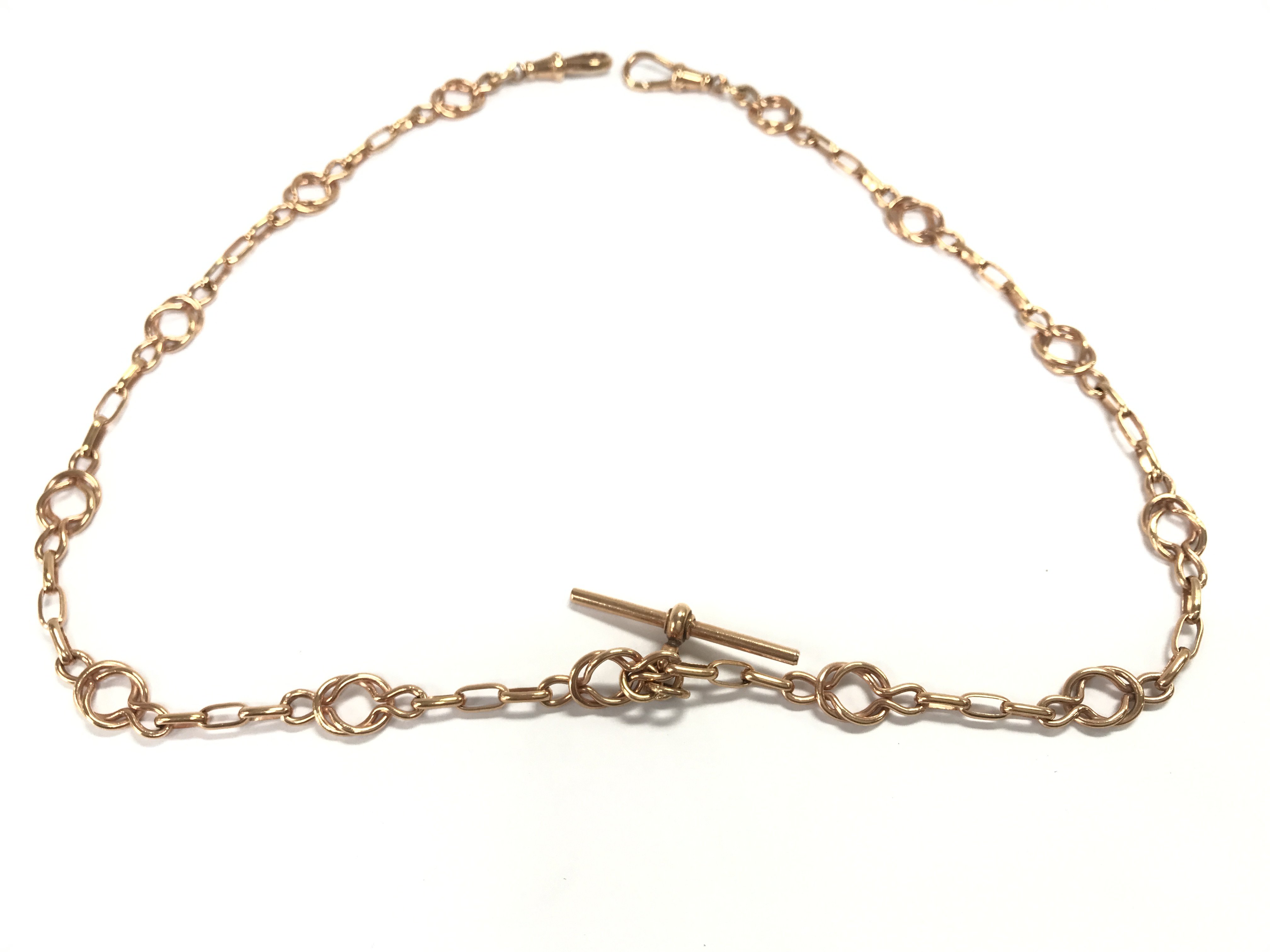 A 9ct gold watch chain. 28.30g and approximately 20 inches long. Postage A