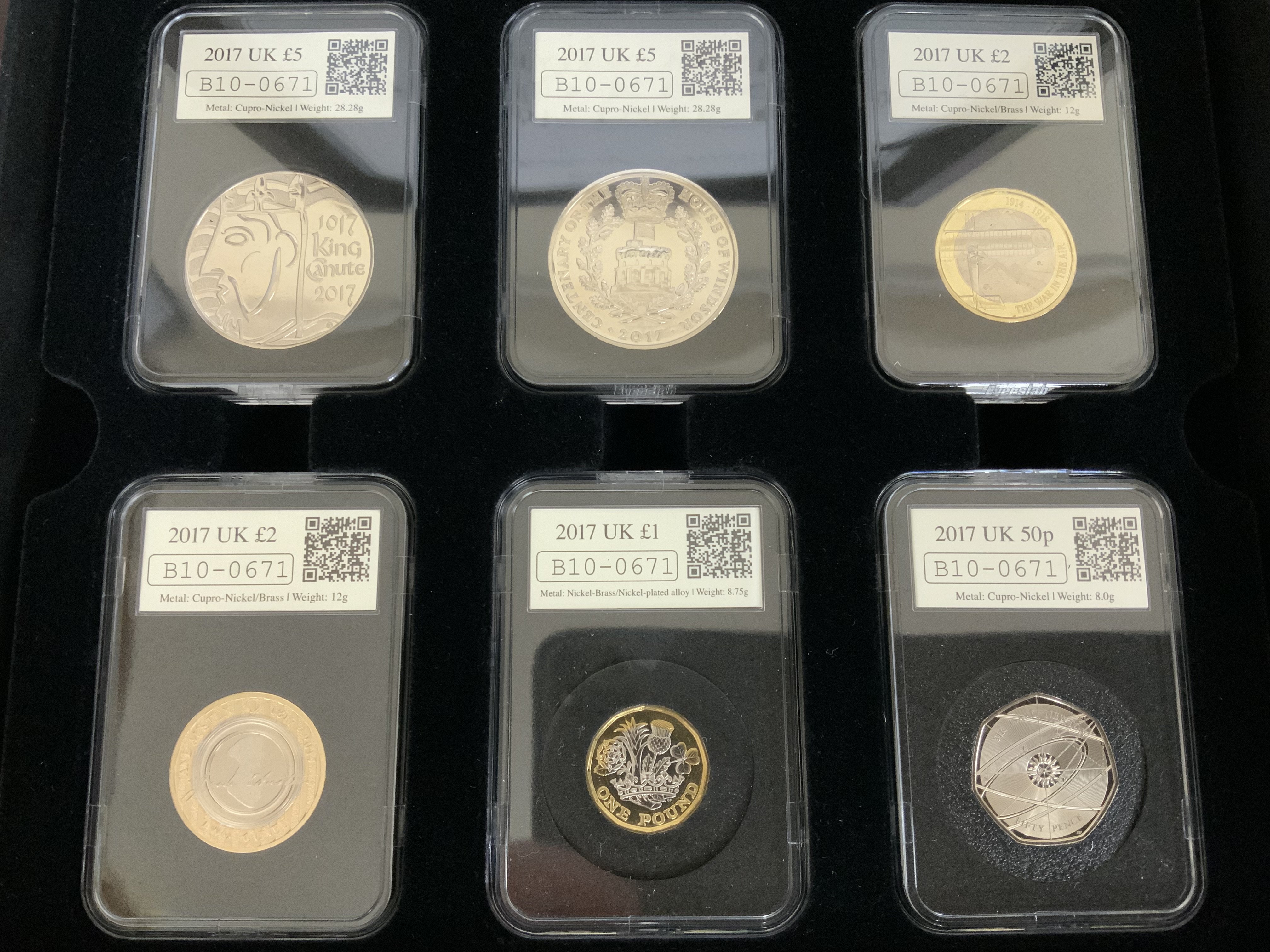 5 cased commemorative coin presentation sets. (B)