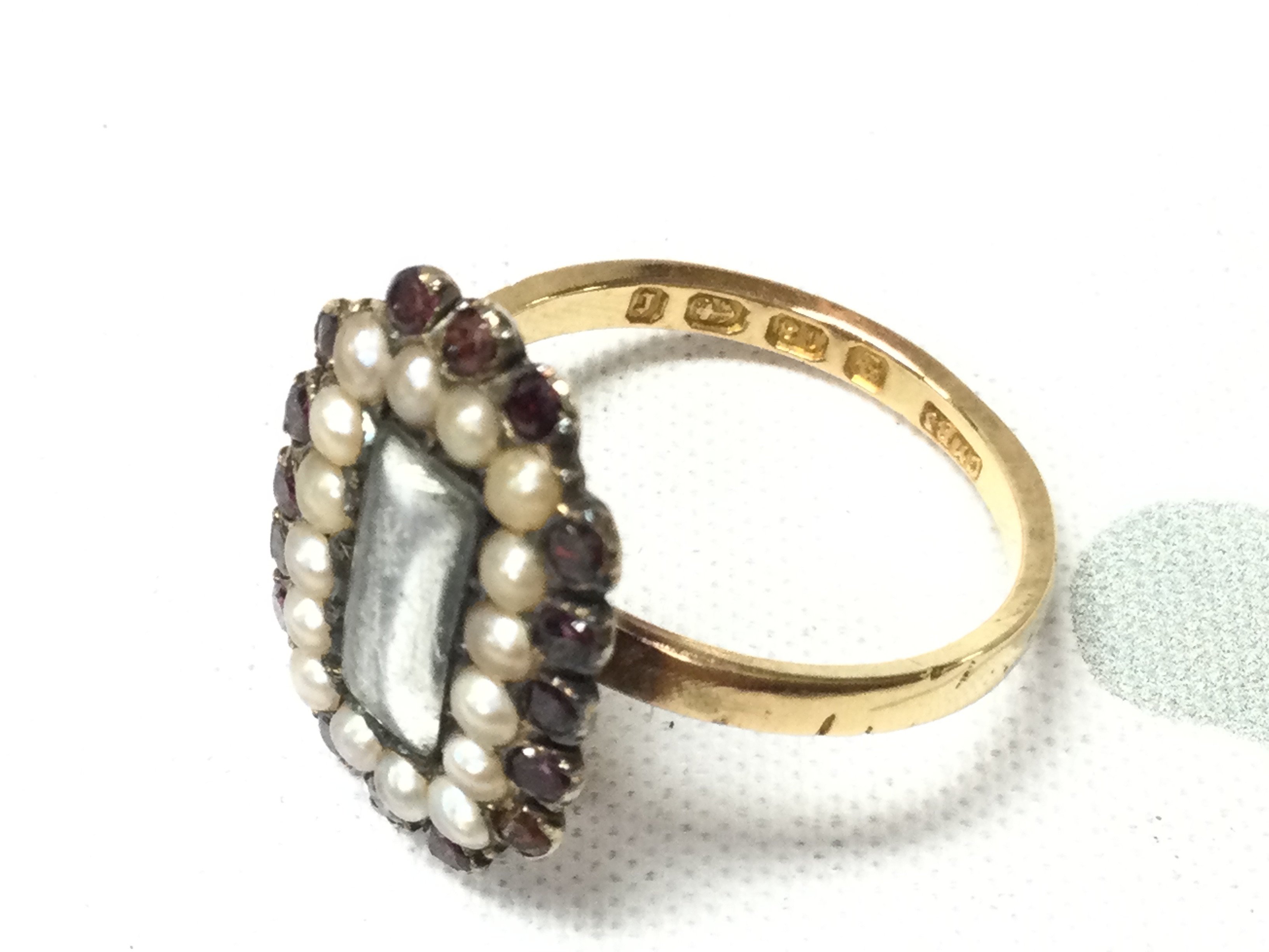 An 18ct pearl and ruby mourning ring. 5.75g and size P 1/2