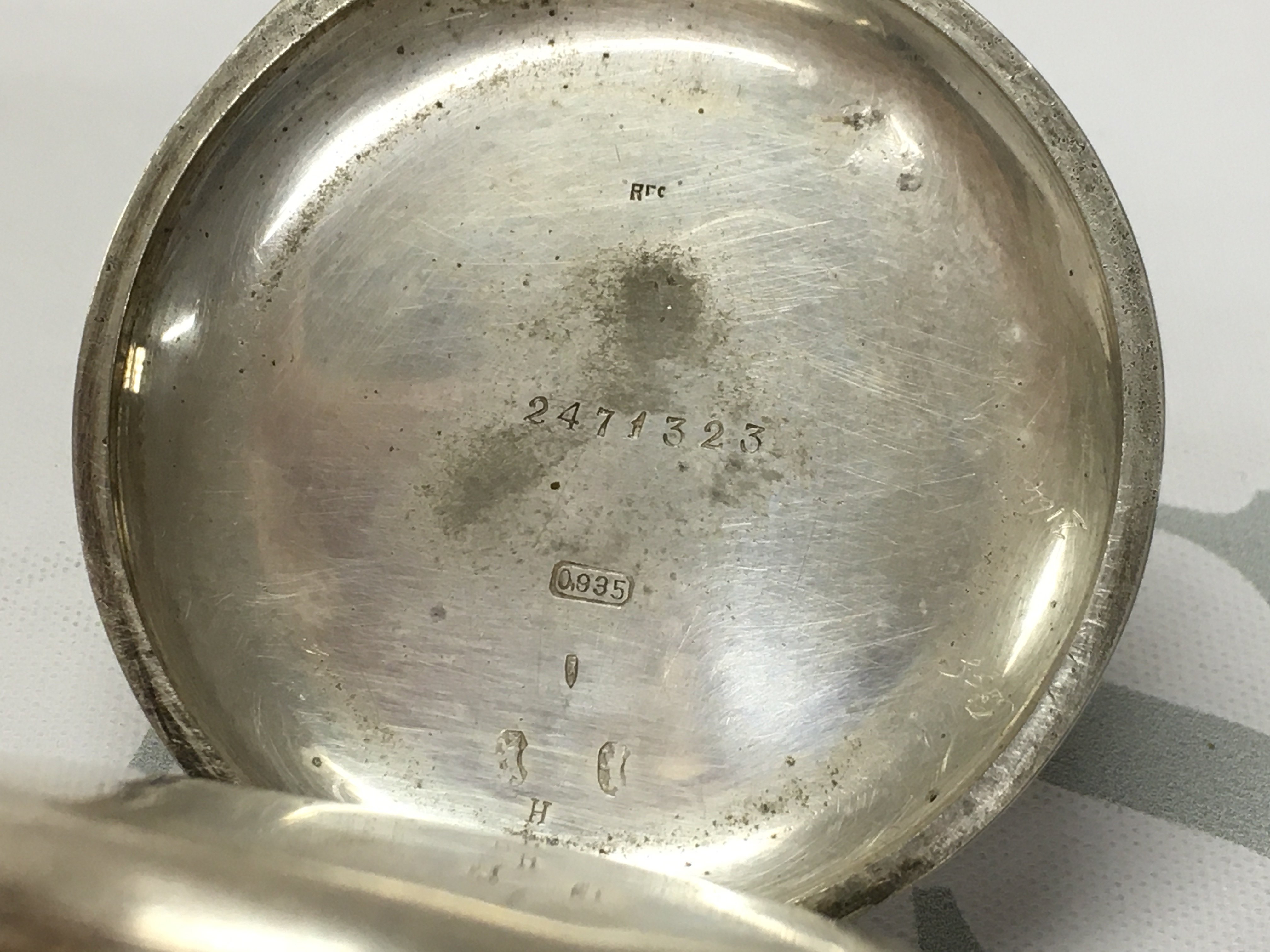 A silver cased pocket stop watch, seen working. Postage category A