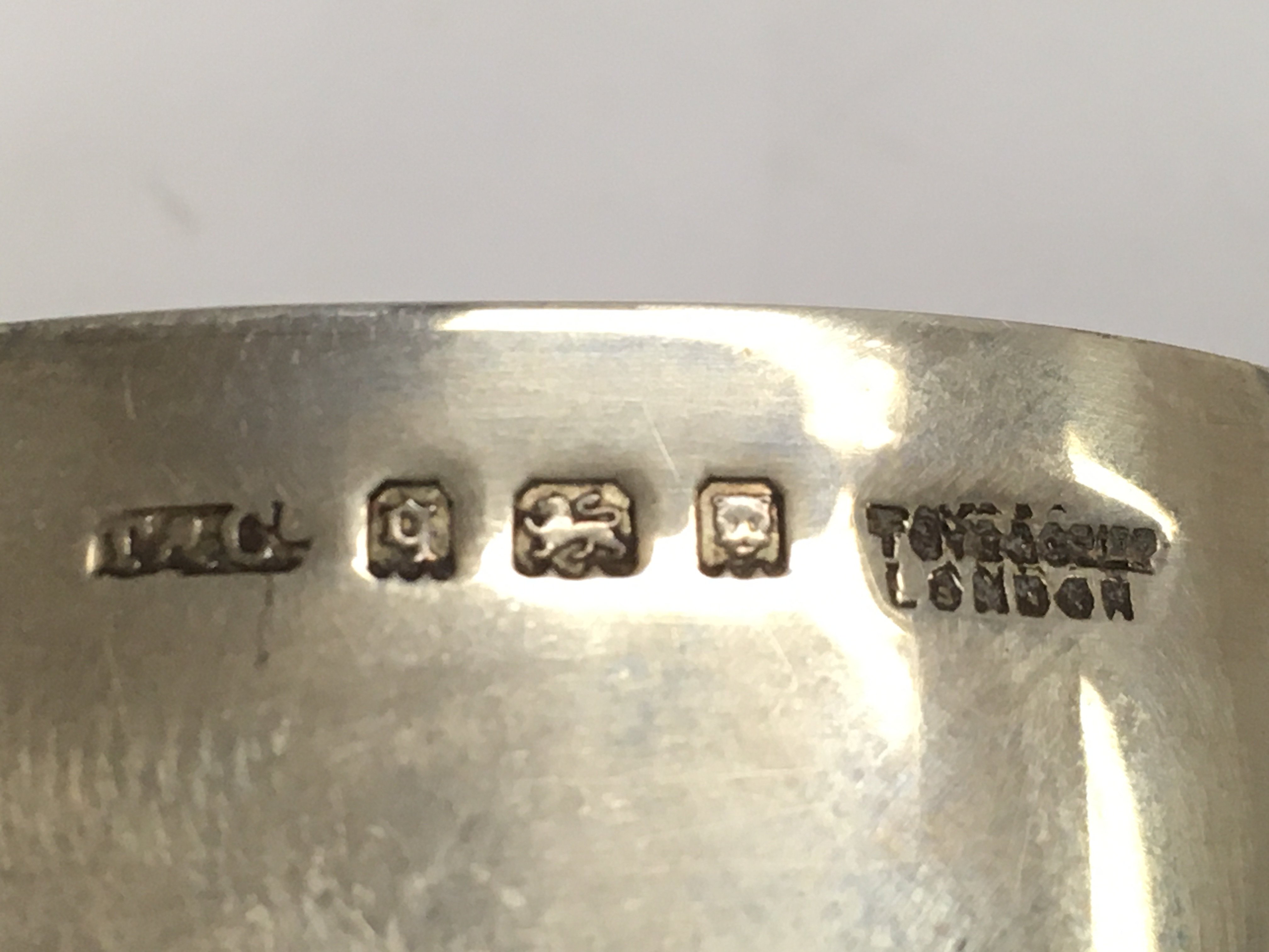 Two silver masonic and enamel Nigeria napkin rings with box. Circa 1931. 122.8g total. Postage B