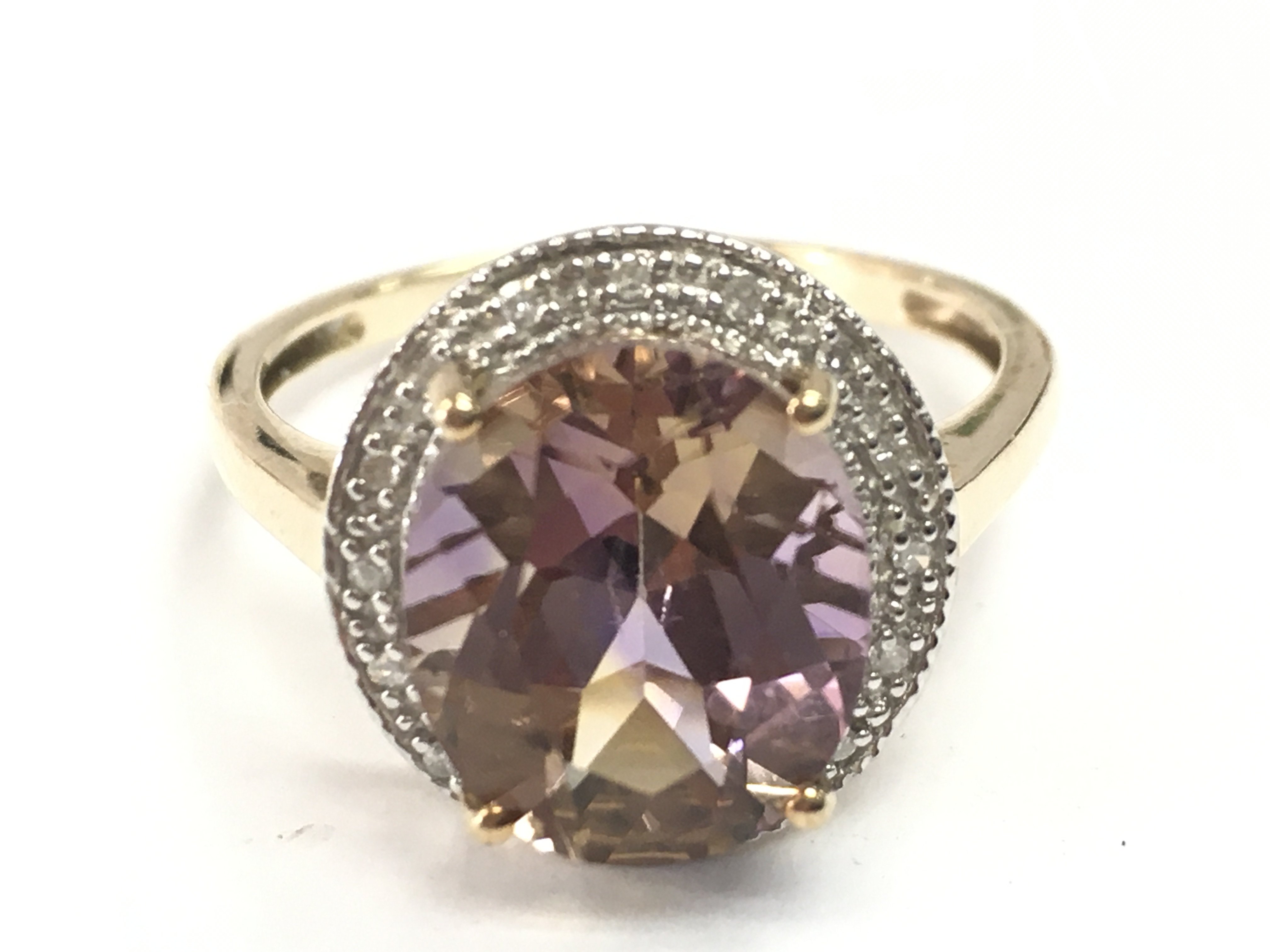 A 9 carat gold Morganite ring, 4.1g total weight. Size S Postage category a.