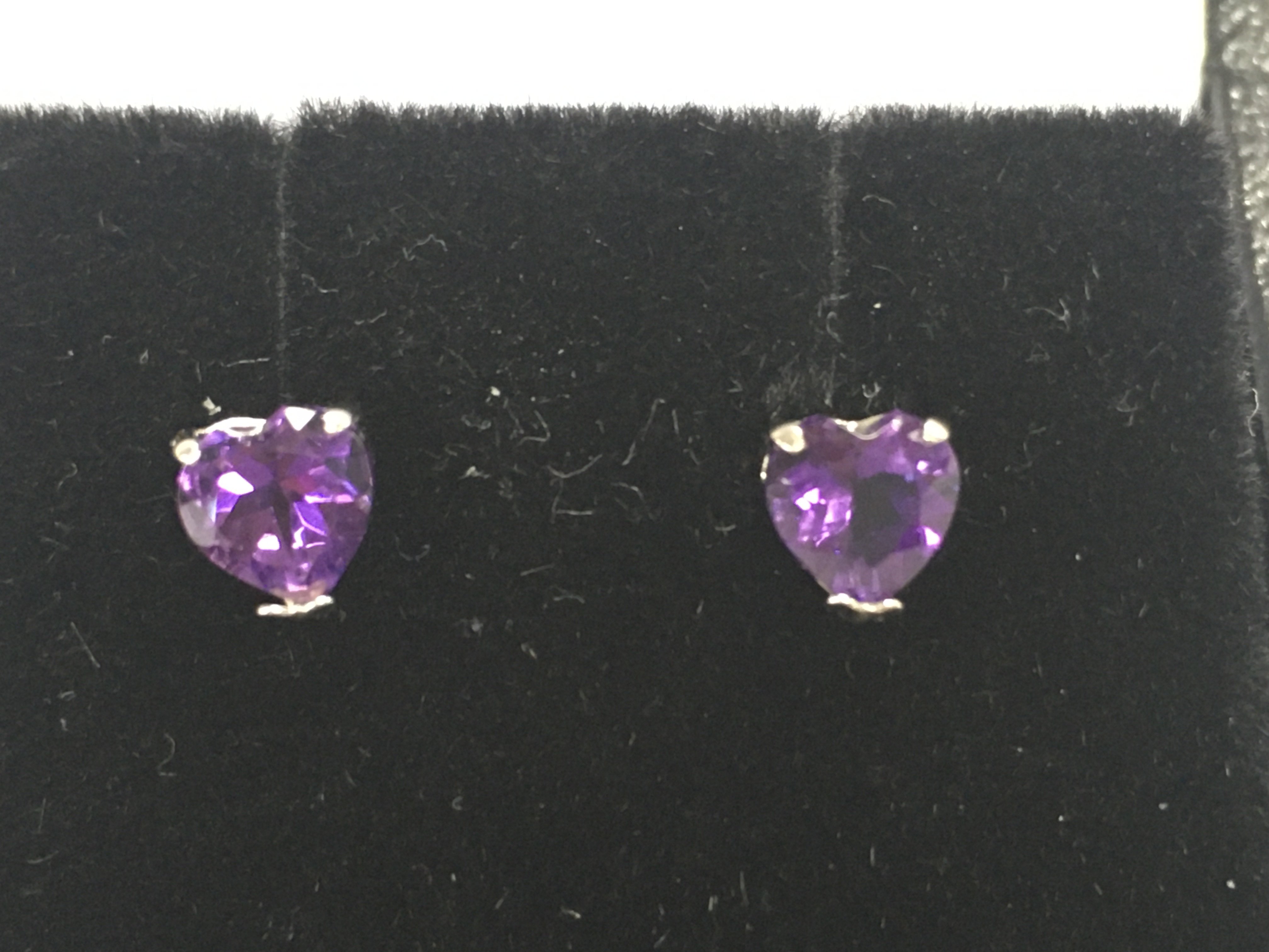 18ct white gold studs set with heart shaped amethyst which are 1.30ct. Postage B