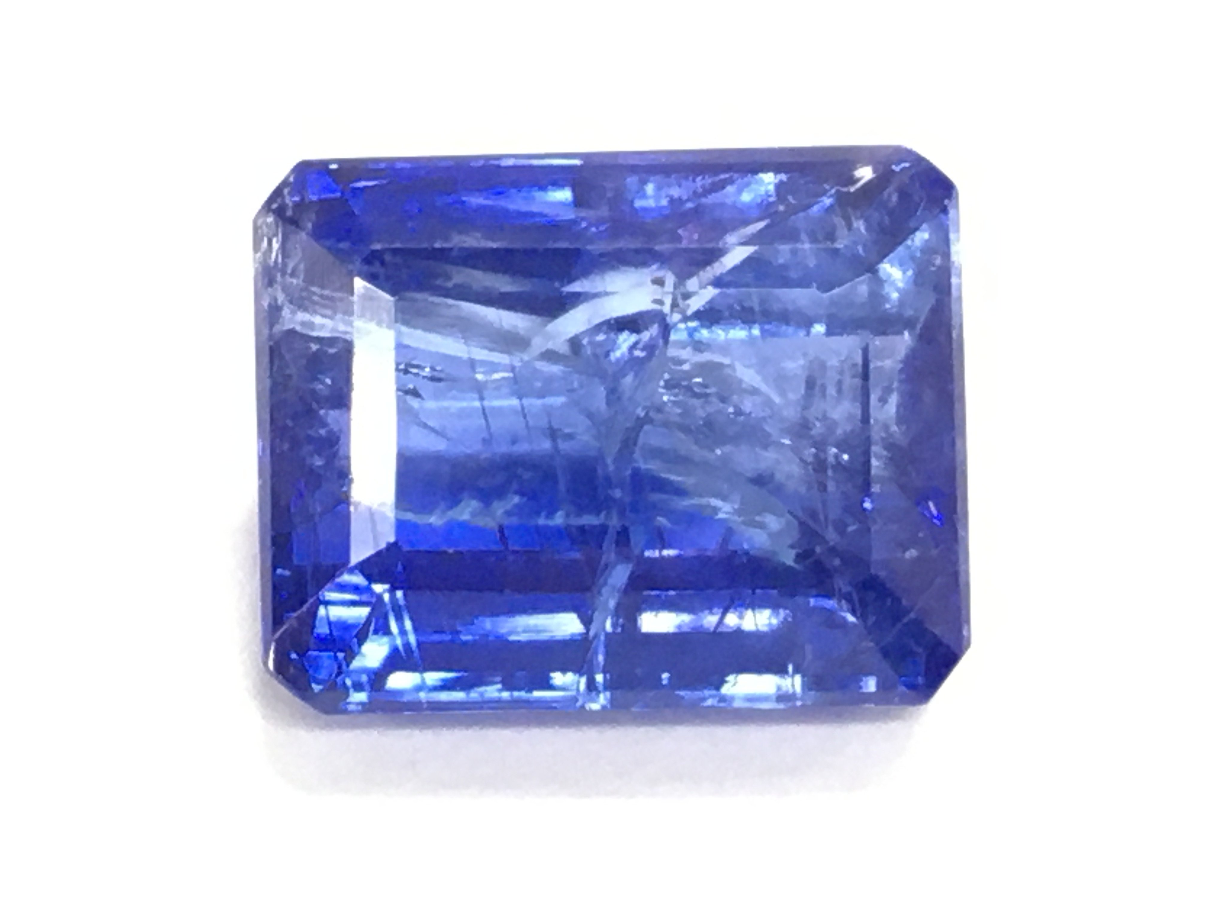 Certified 8.77ct loose octagonal step cut tanzanite.