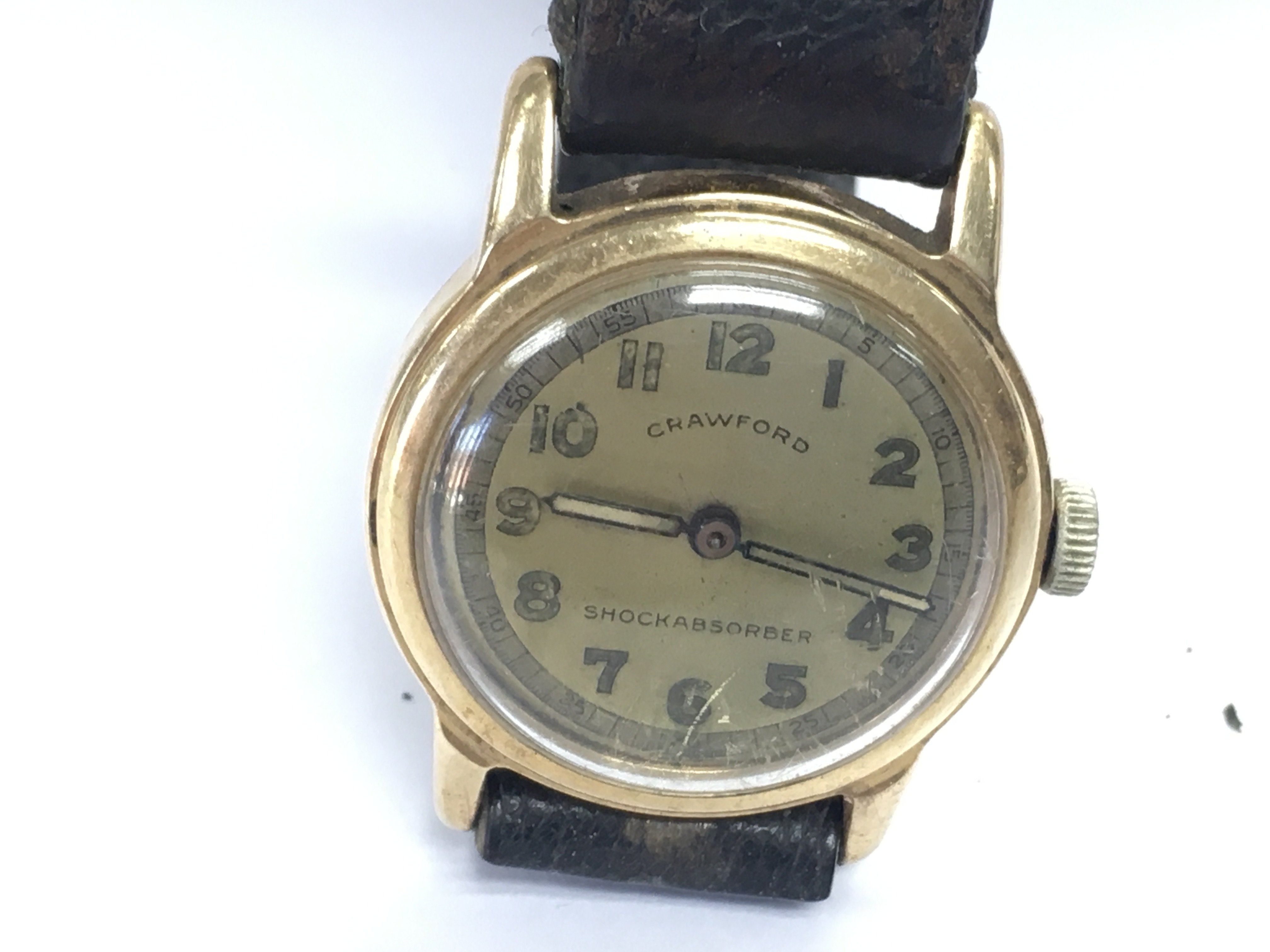 A gents 1940s 14ct gold cased Crawford watch. Winds and runs. 35.28g total weight