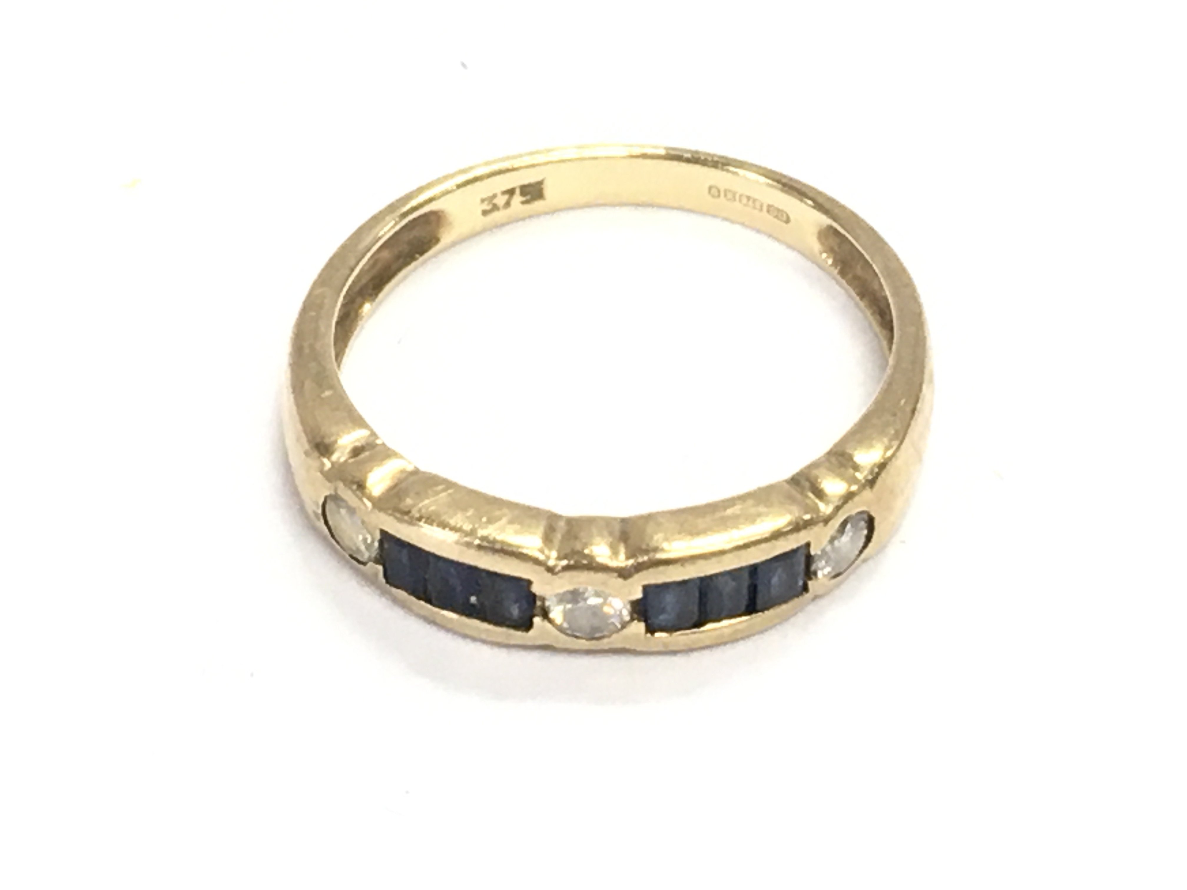 A 9ct sapphire and diamond ring size N and 2.27g Postage A
