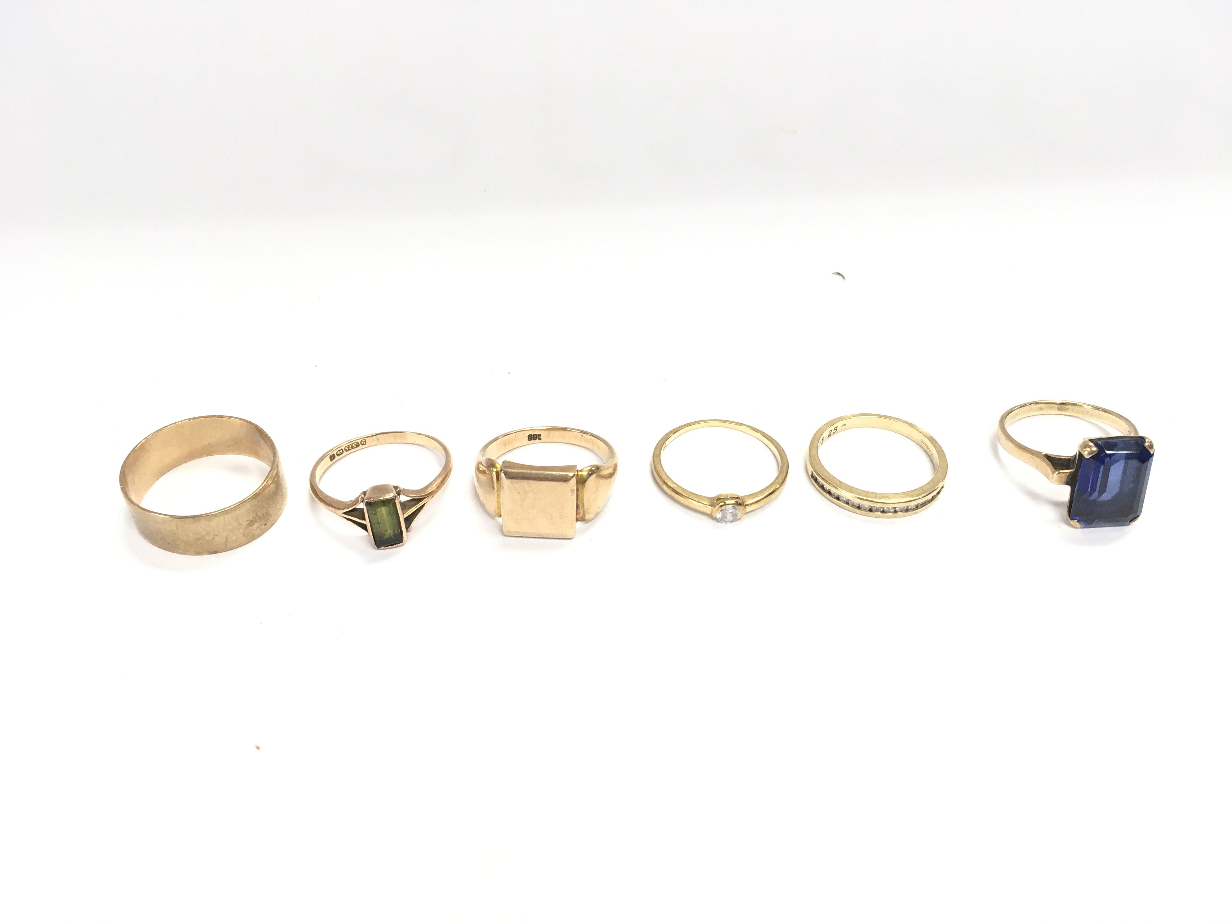 6 9ct gold rings set with various stones. 21.84g