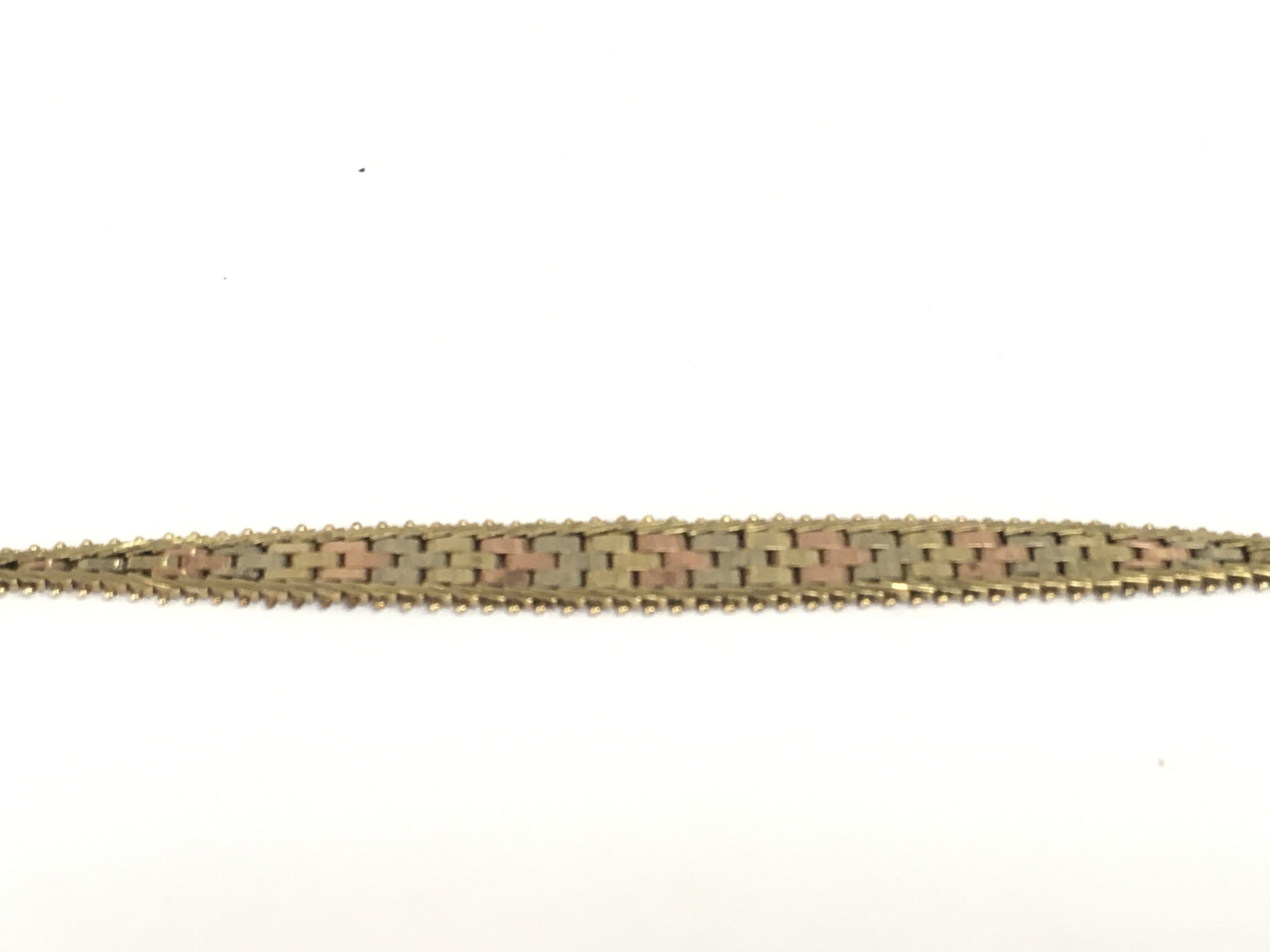 A 9ct gold three colour bracelet.