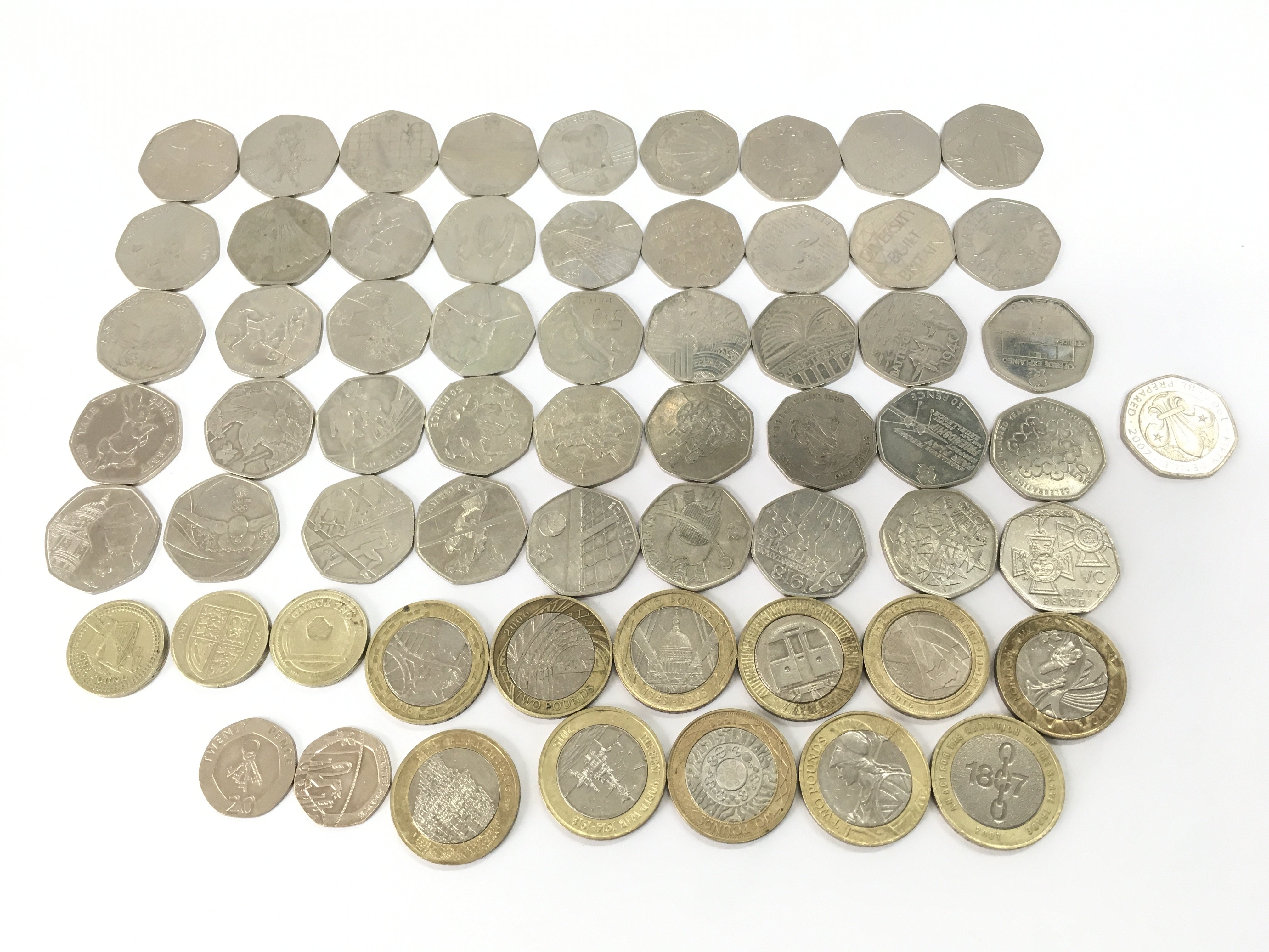 A collection of assorted 50p and &#20132662752 coins including Olympic Paddington etc. Postage A