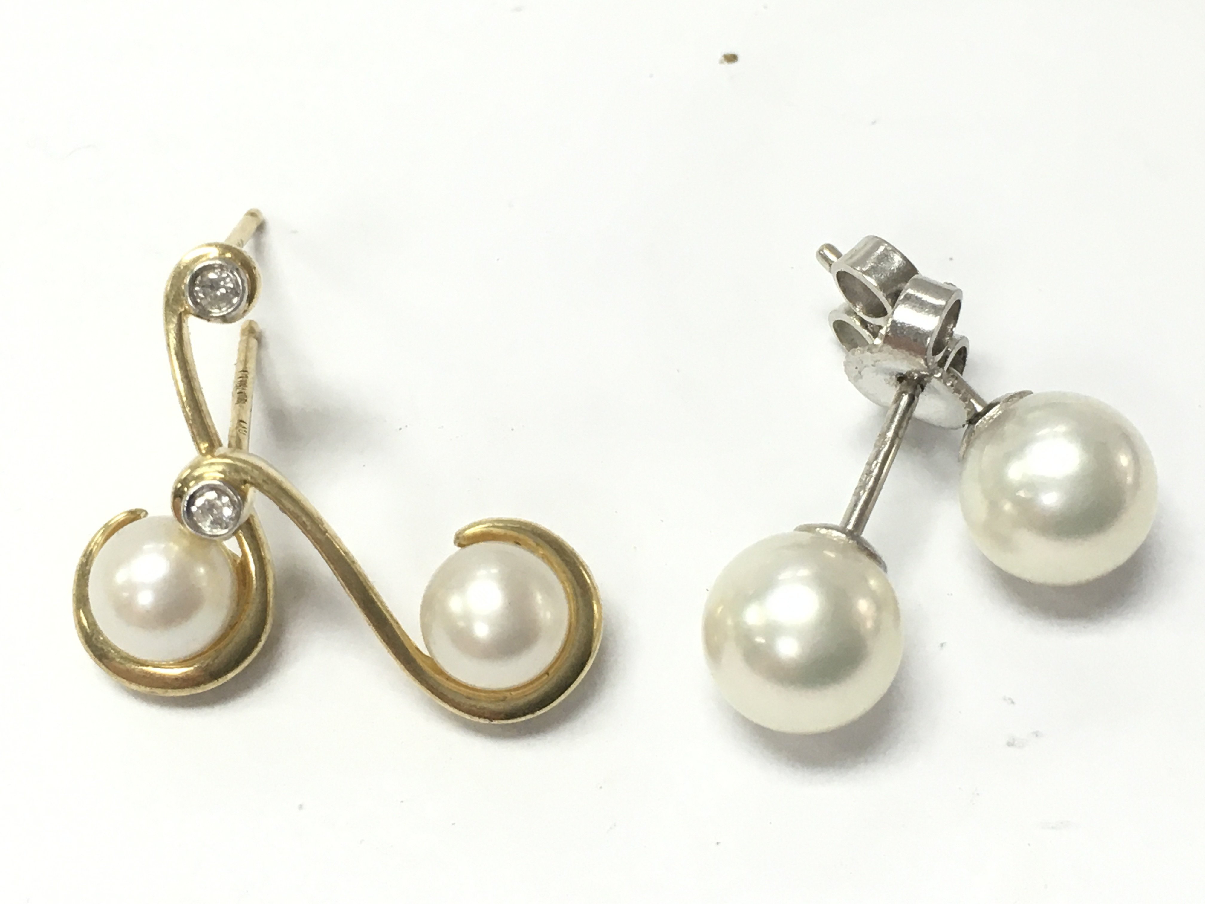 18ct yellow and white gold pairs of pearl earrings , 3.8g postage category A