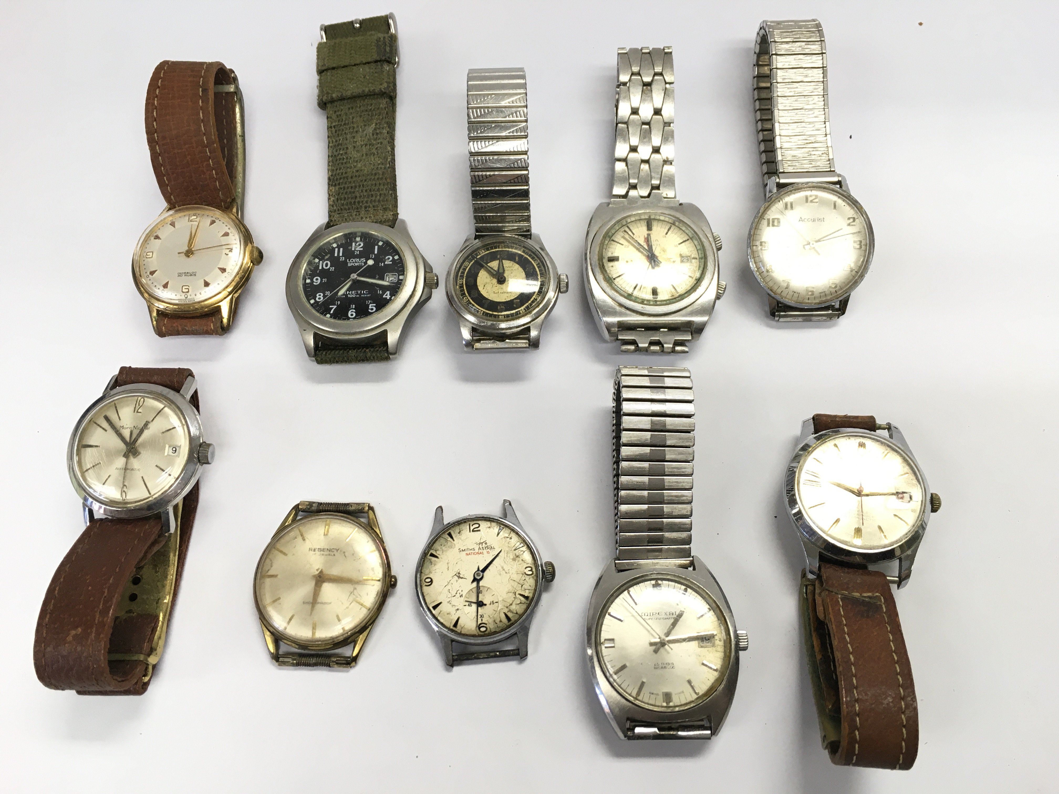 A collection of assorted vintage watches including Avia Accurist etc Postage B