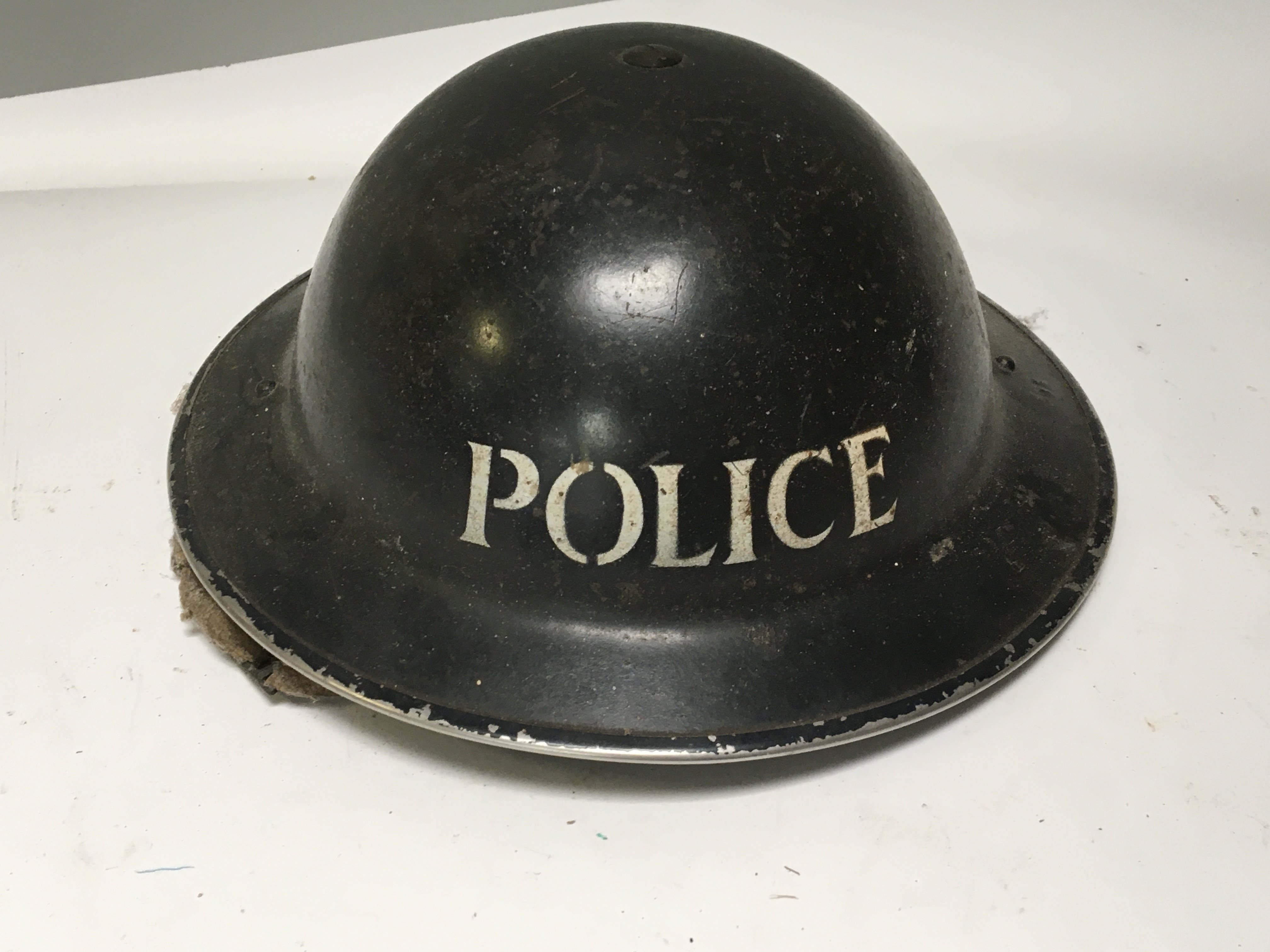 A II world war British civilian police issue steel helmet. With liner.