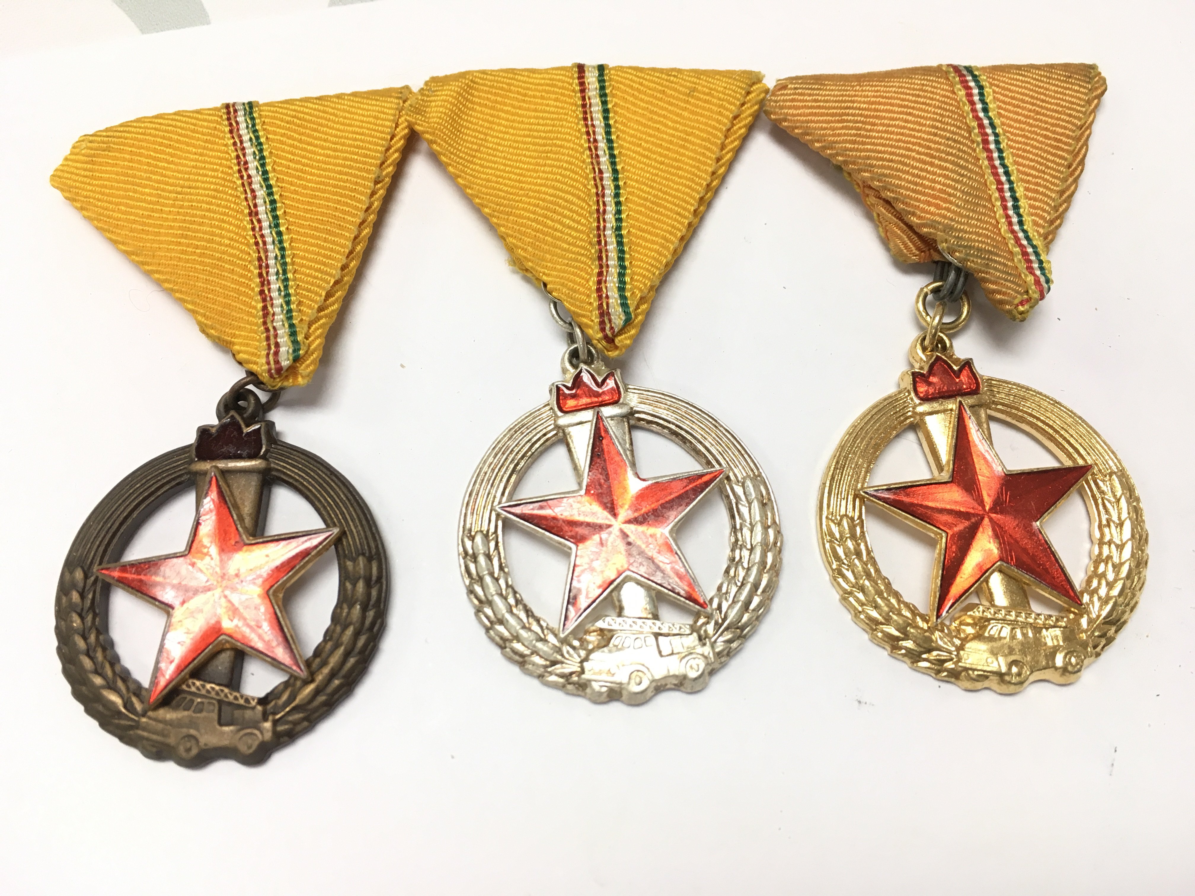 A collection of Hungarian Fire Protection medals in different grades . Postage category A