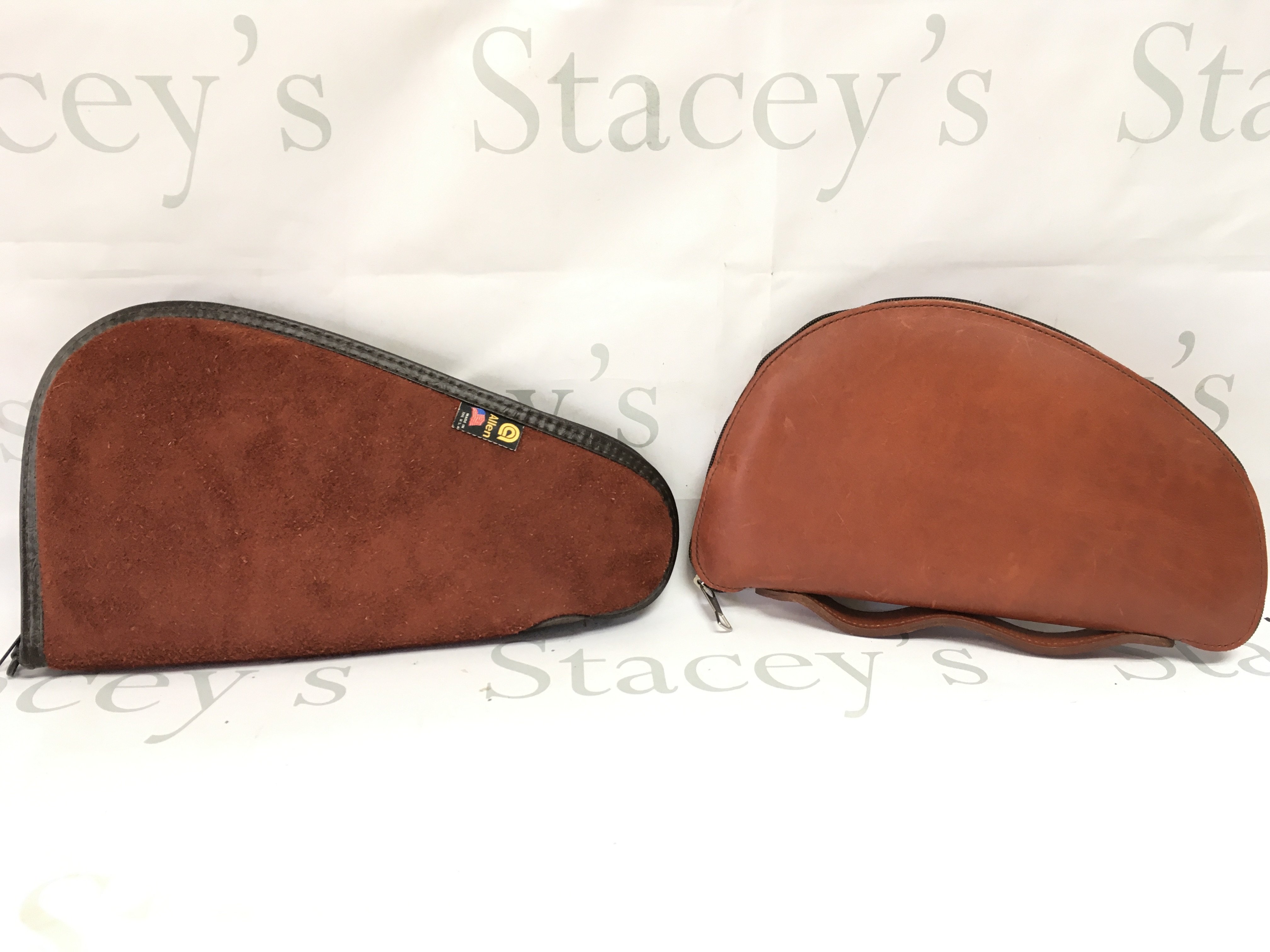 Two leather and sheep skin pistol cases. postage category B NO RSERVE