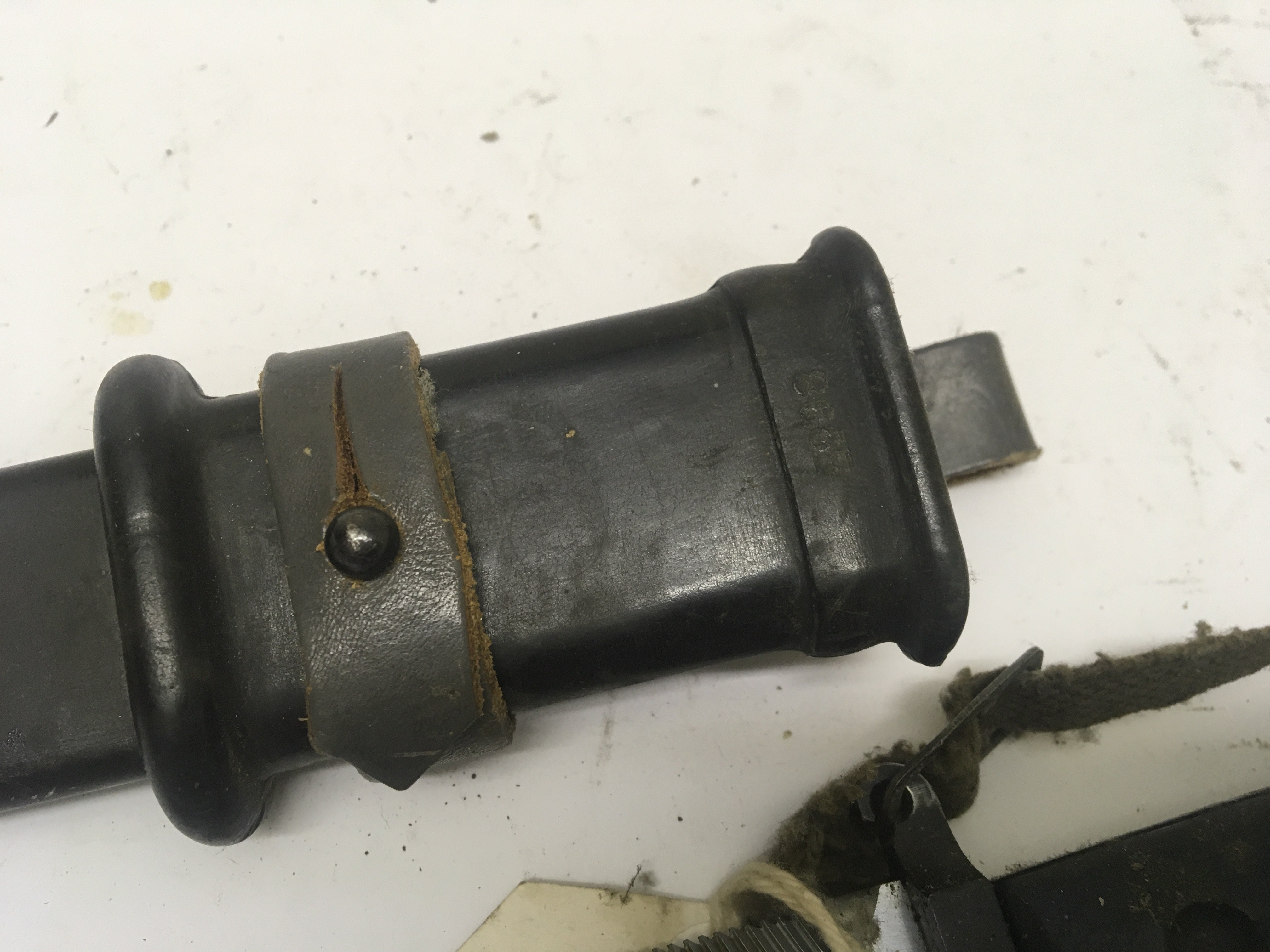 An AK47 Kalashnikov bayonet the scabbard end with wire cutter. NO RESERVE