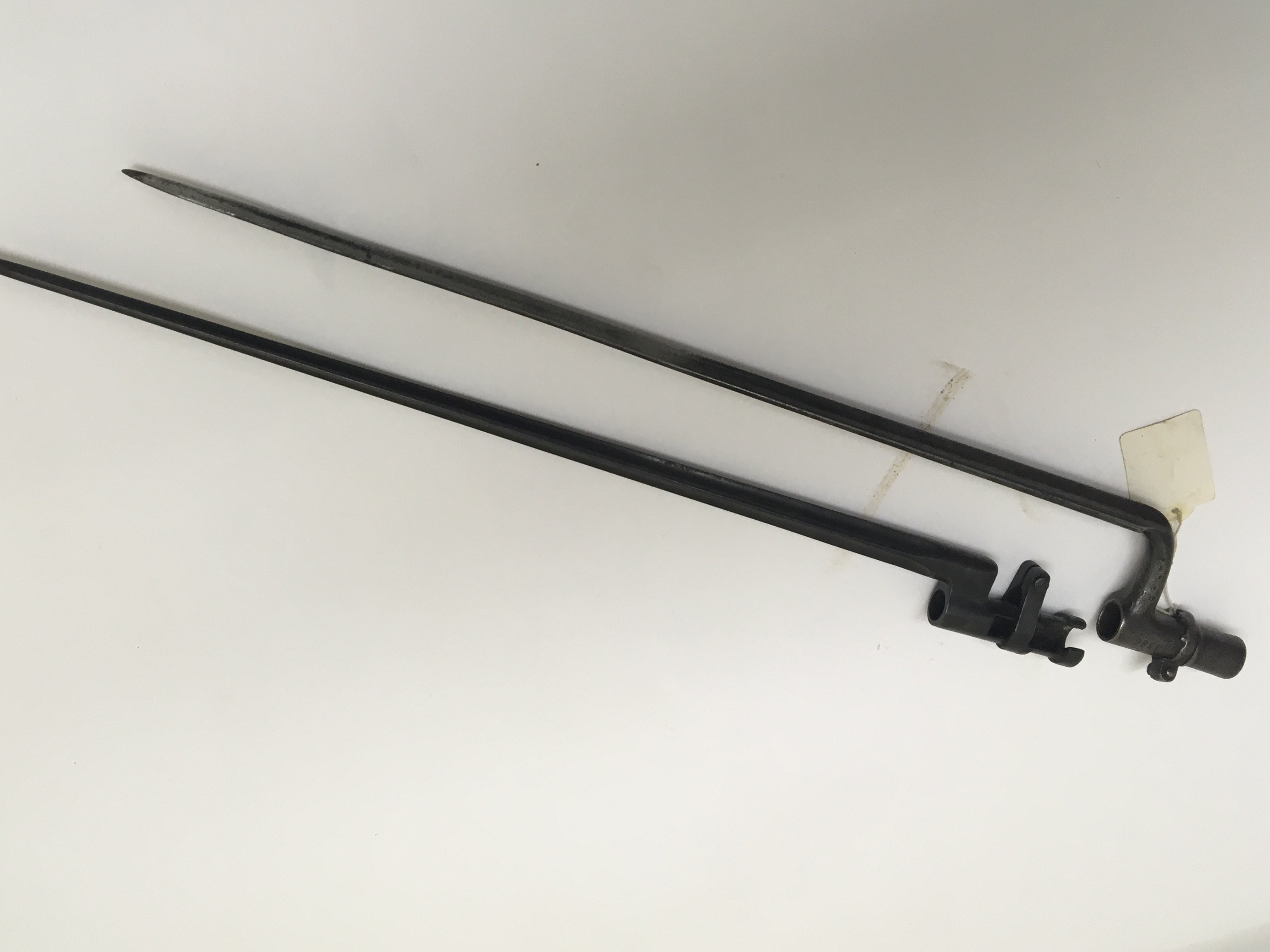 Two late 19th Century stick bayonets one possible Russian with serial number K 3589. Lenght 54cm. NO RESERVE