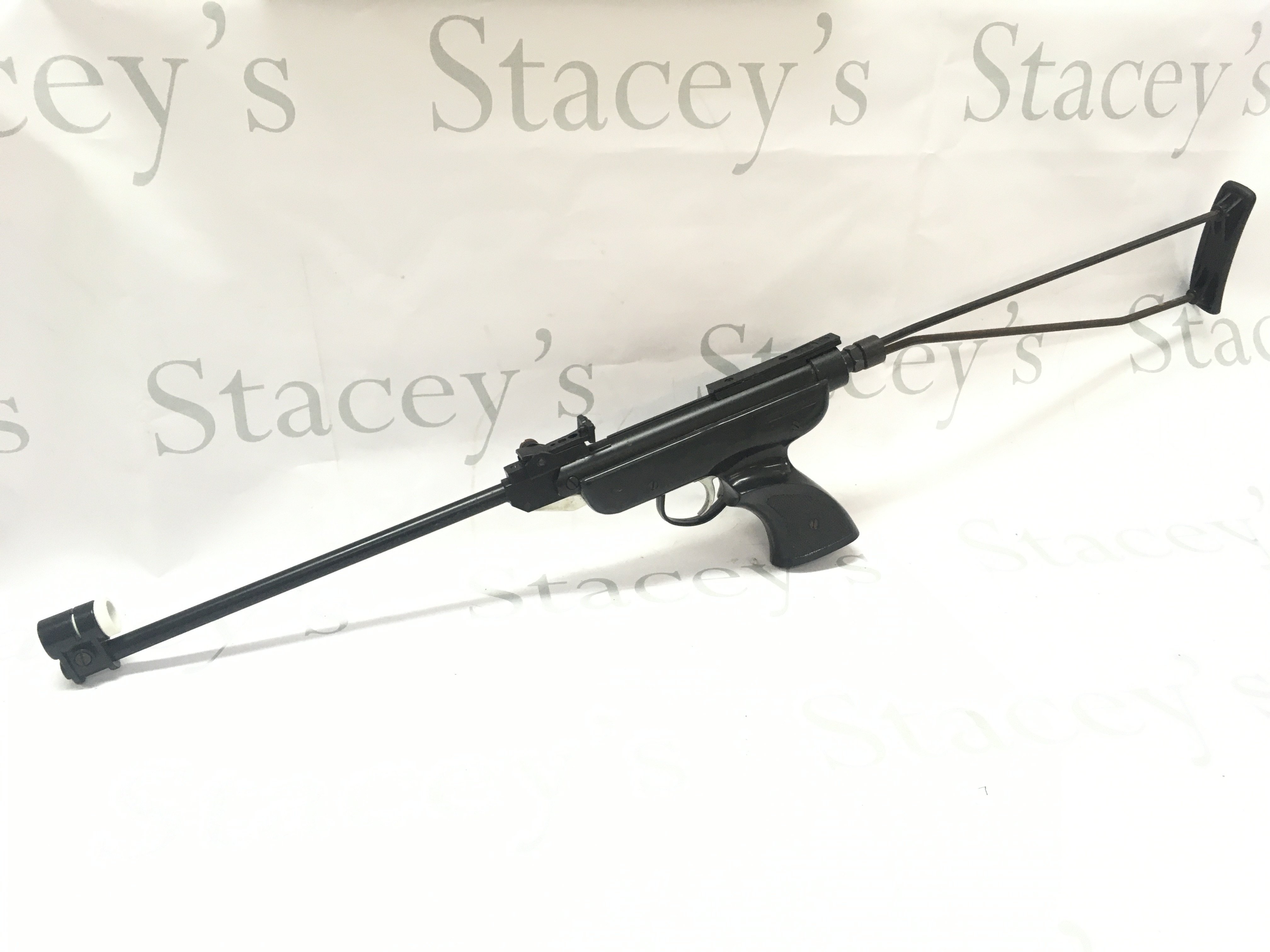 A vintage Italian air pistol .45 calibre with shoulder mount , 84cm long.