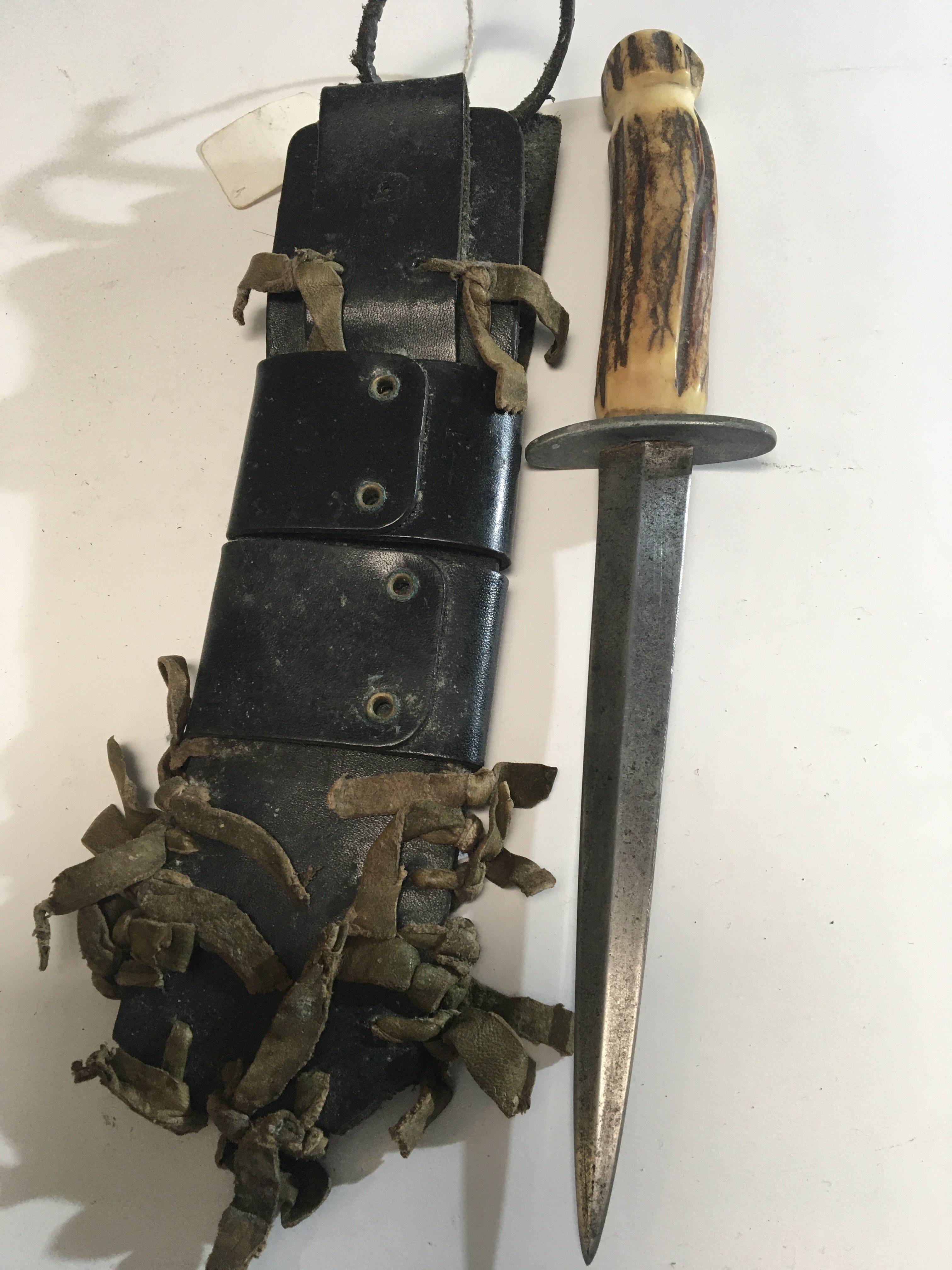An interesting fighting Knife with a horn handle and leather bound scabbard possible Burmese Chindit Special Ops knife used between 1943-1944