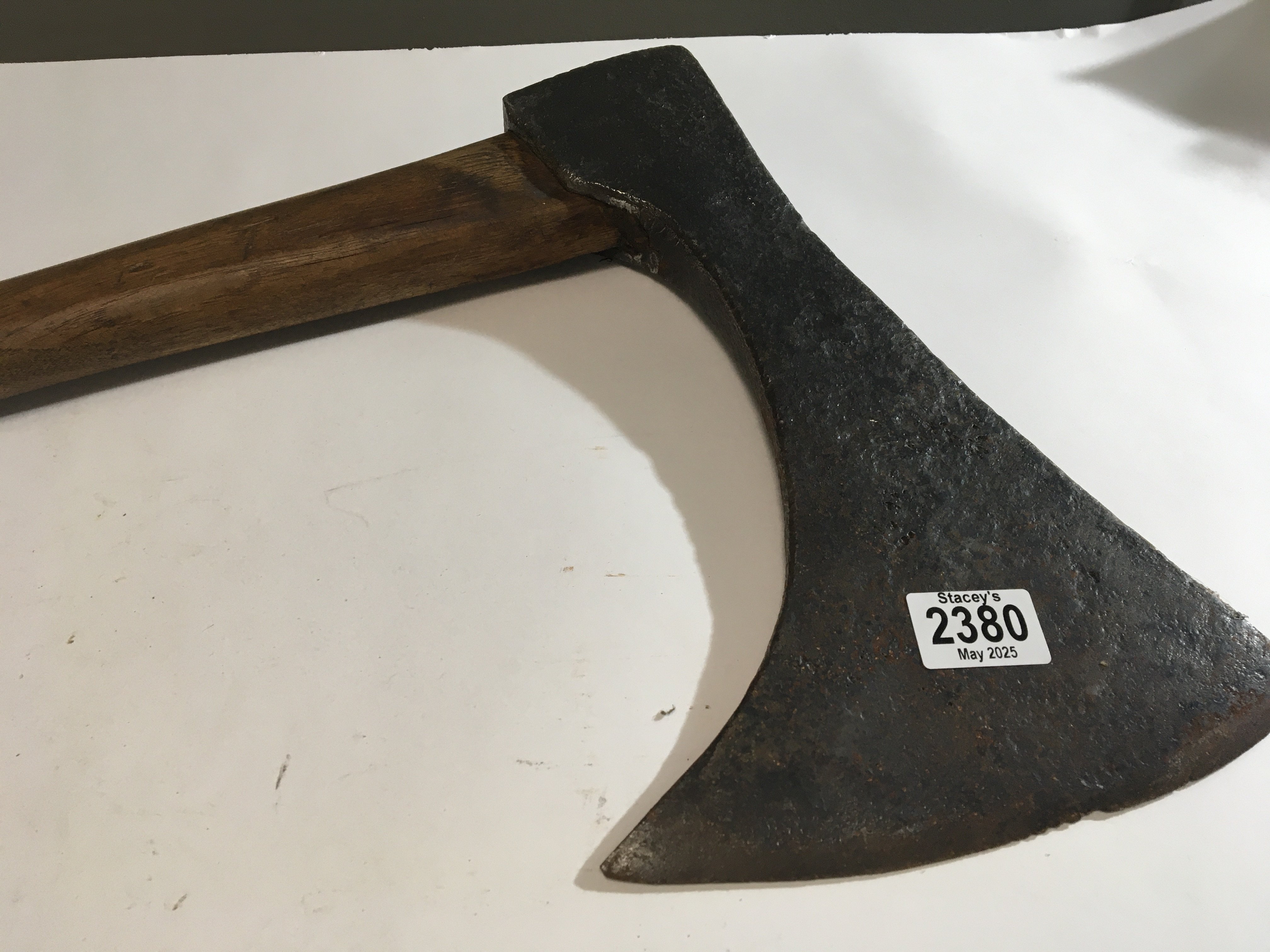 A Medieval or later executioners axe possible with a later wooden shaft the head 34cm wide.