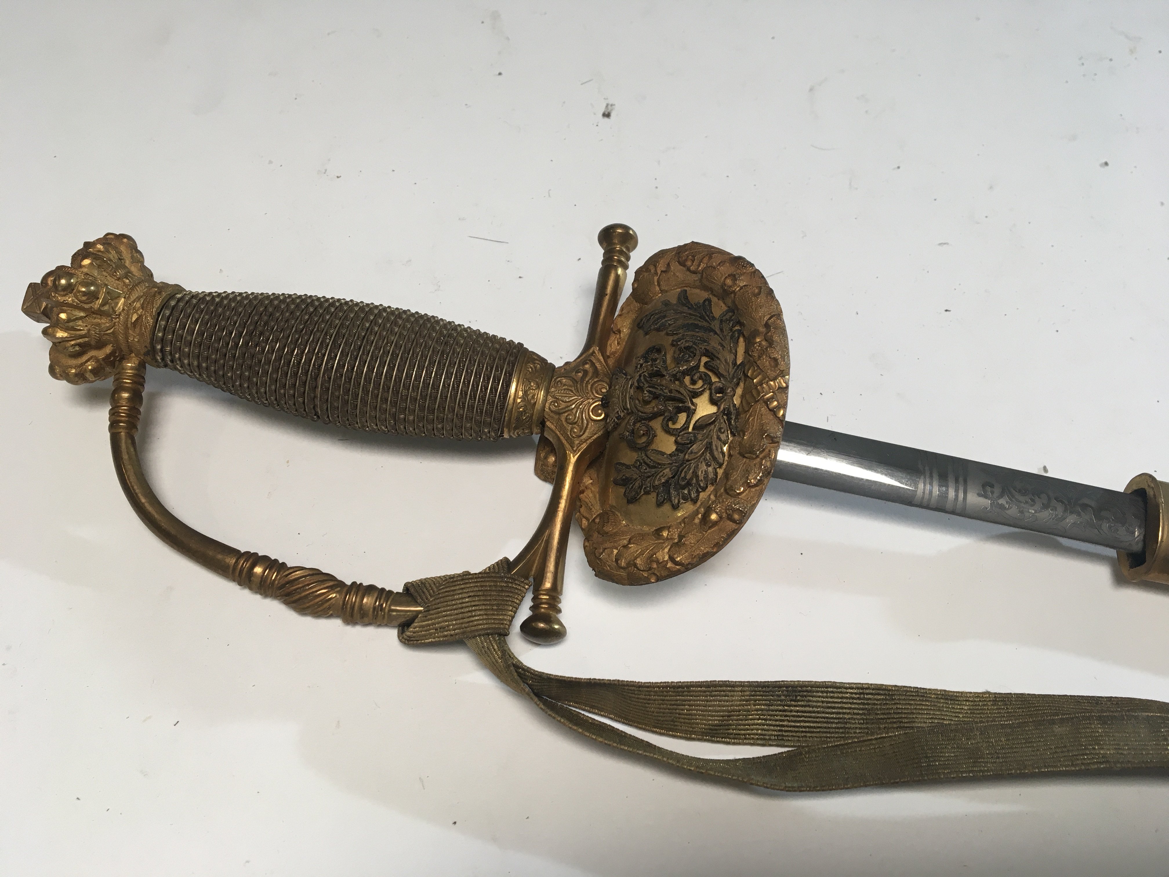 A Quality William IV British Diplomatic Court sword with gilt decoration hanging pommel and raised Kings Cypher engraved blade.