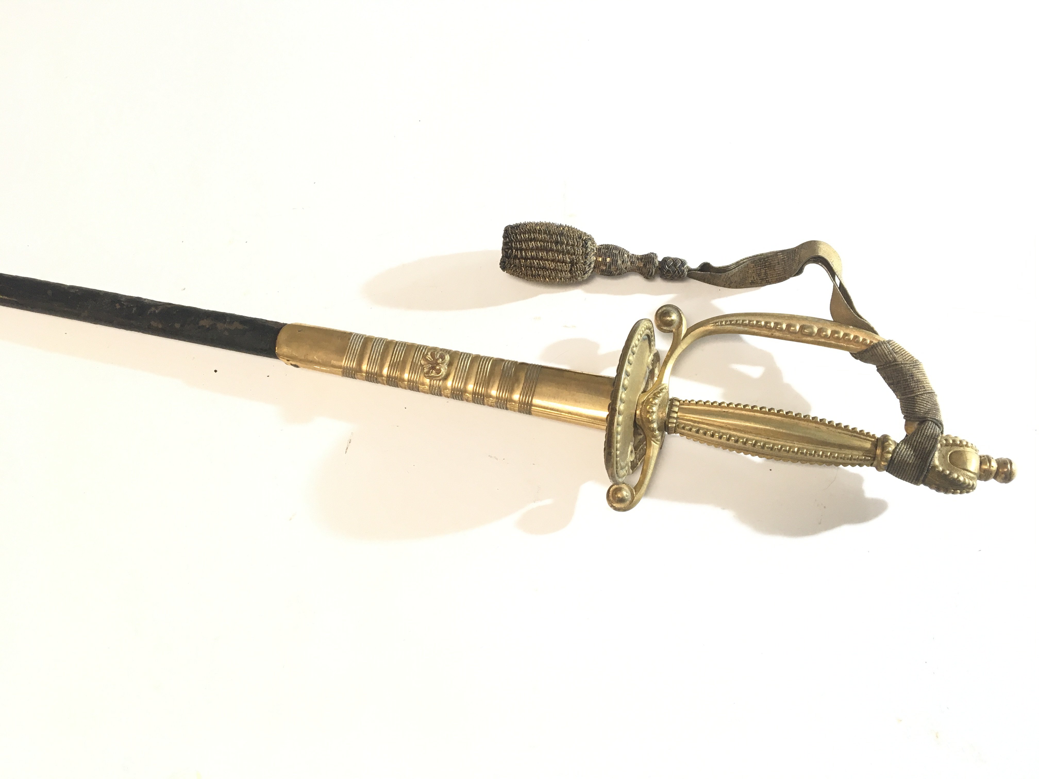 A British gilt metal Diplomatic Court sword the blade with Royal Cypher. With leather and gilt metal mounted scabbard.