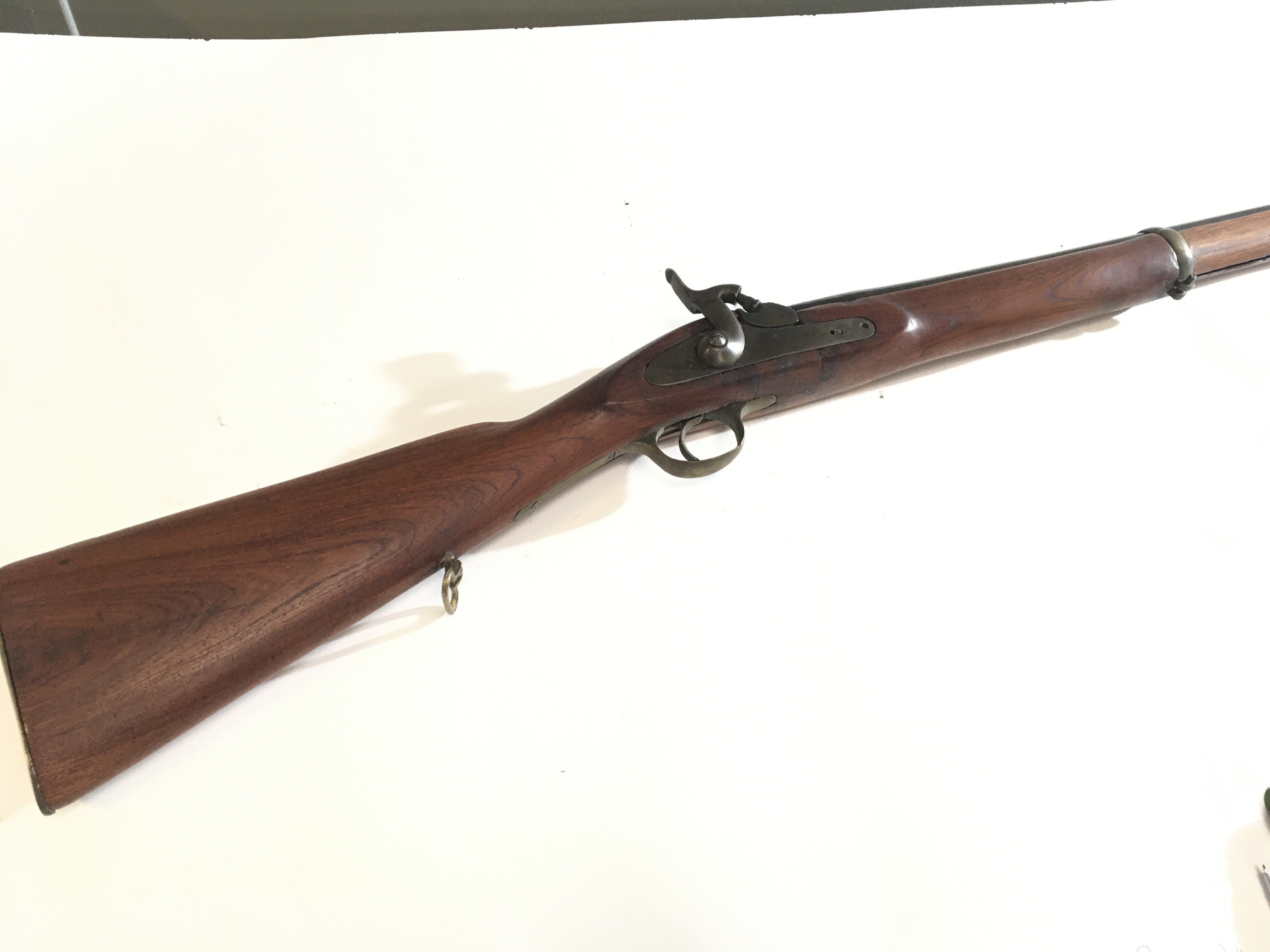 A 19th century muzzle load Percussion Rifle with full length stock brass fittings no obvious makers marks or similar.