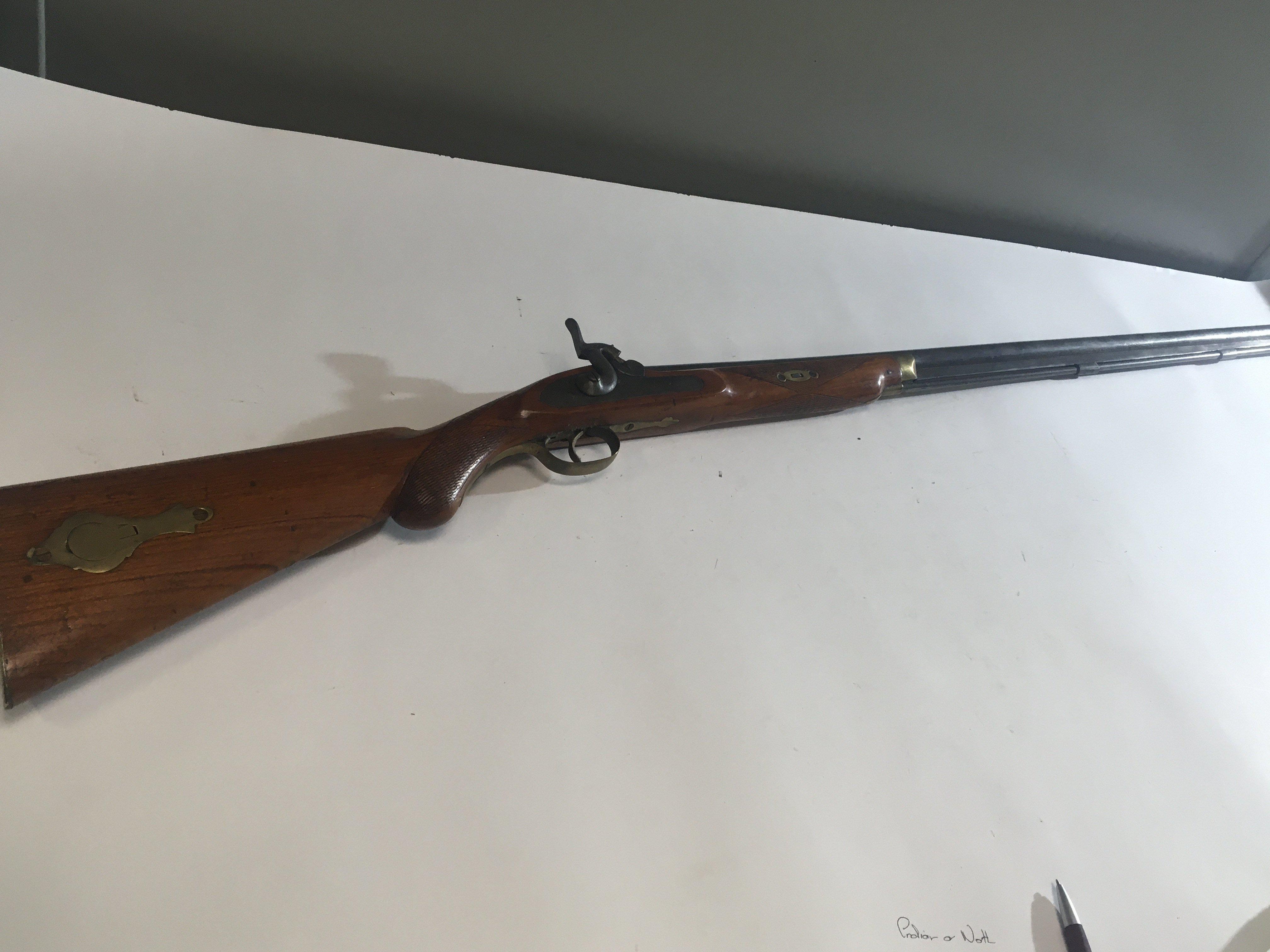A 19th century Percussion Rifle with half length stock muzzle load sporting gun with brass fittings.