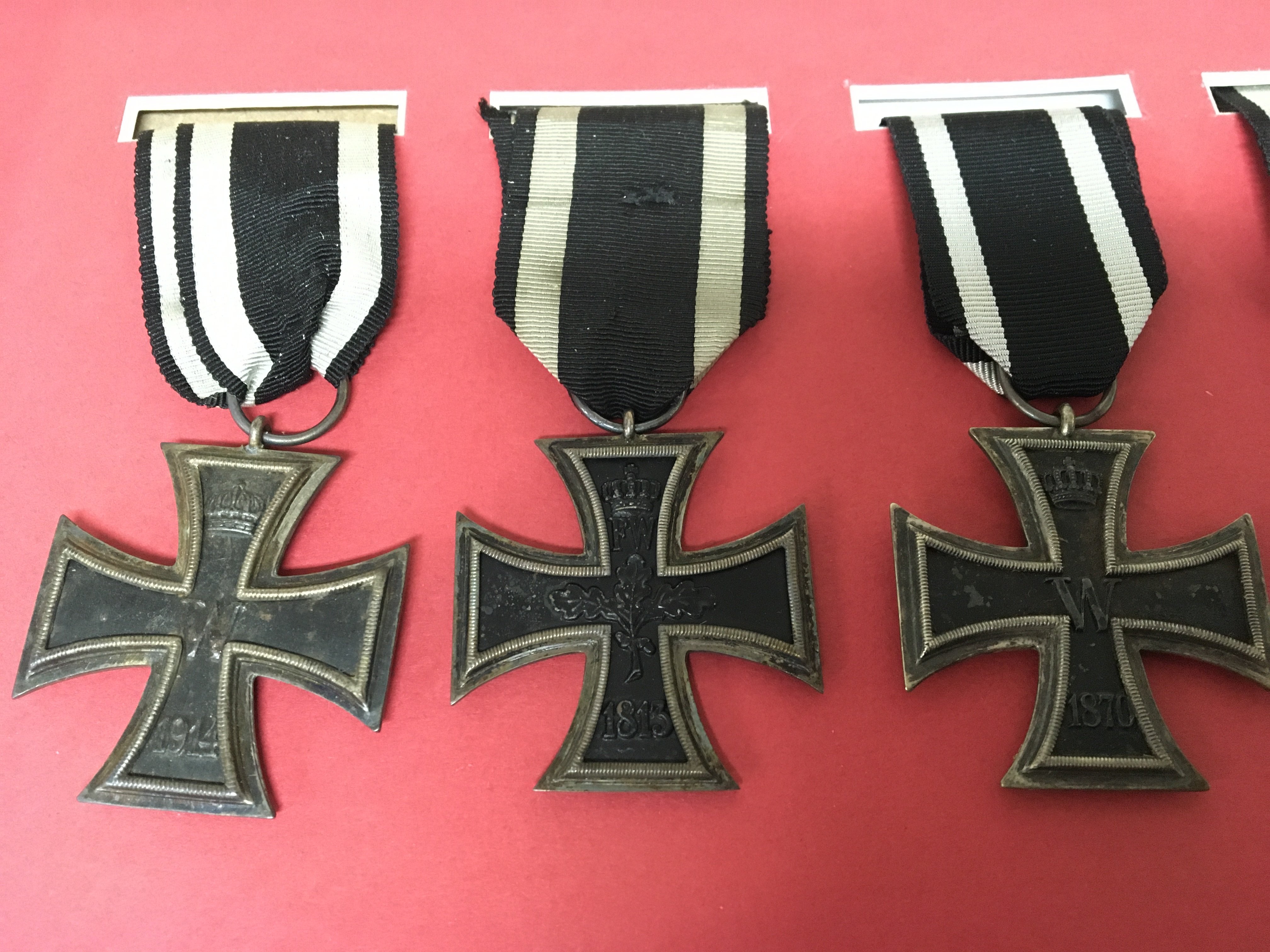 A collection of Imperial German I world war iron cross medals second class and two German Third Reich II world war medals all appear authentic however please satisfy yourselves before you bid. (7)