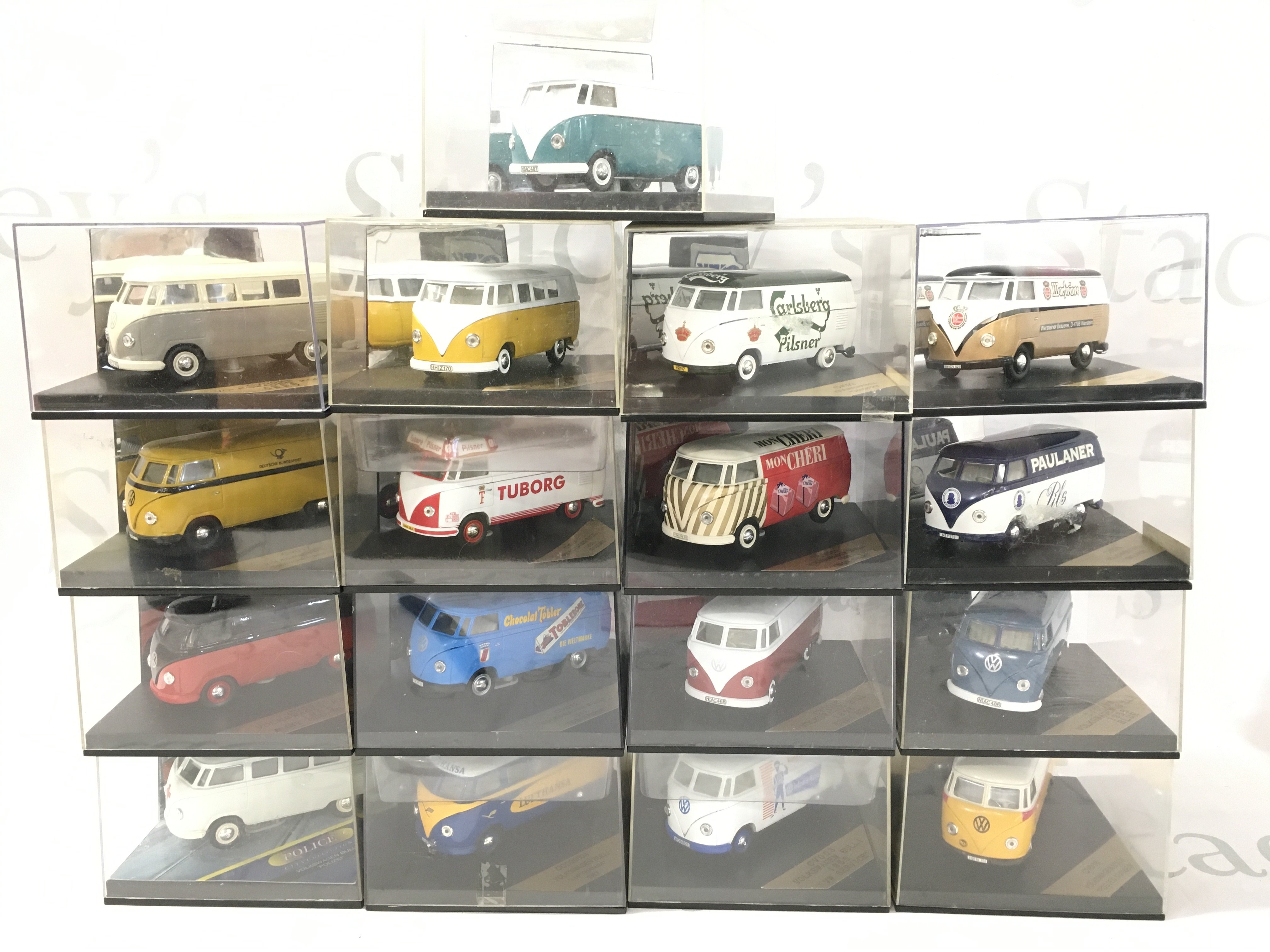 A Collection of Boxed City Volkswagen Vans.
