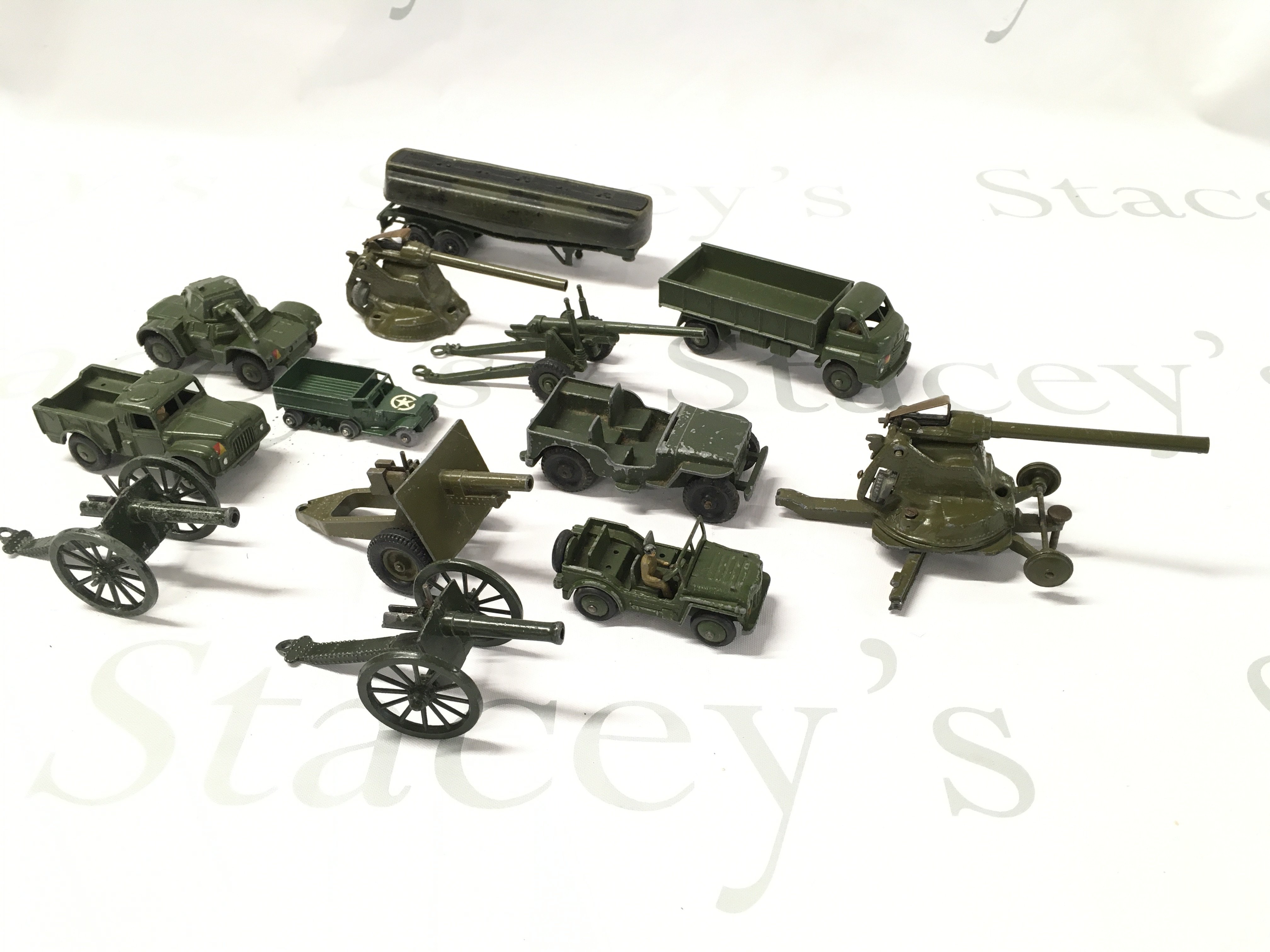 A Small Collection Of Playworn Military Diecast Including Britains And Dinky.