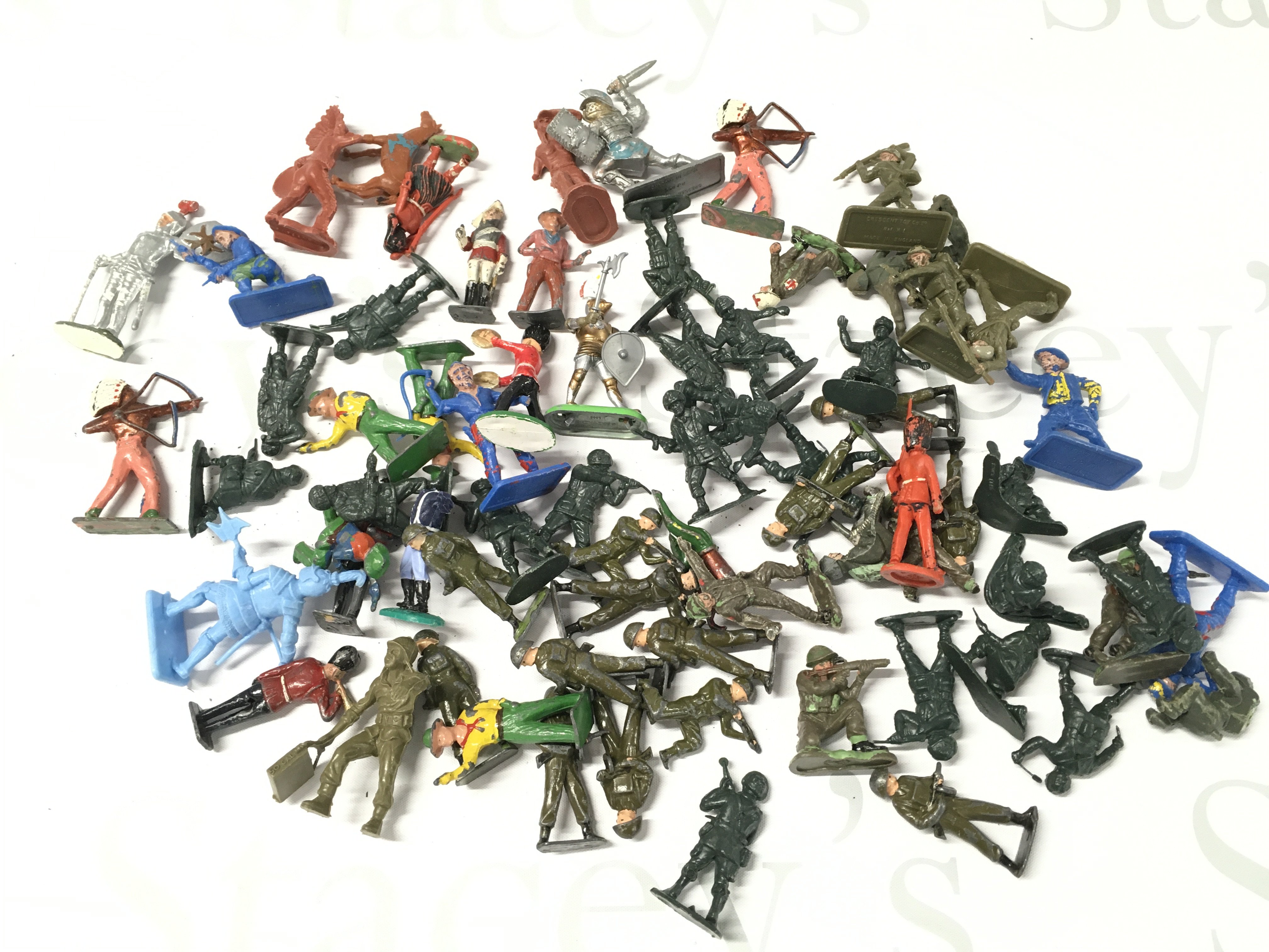A Small Collection of plastic/Diecast Toy Soldiers including Britains And Crescent Toys.