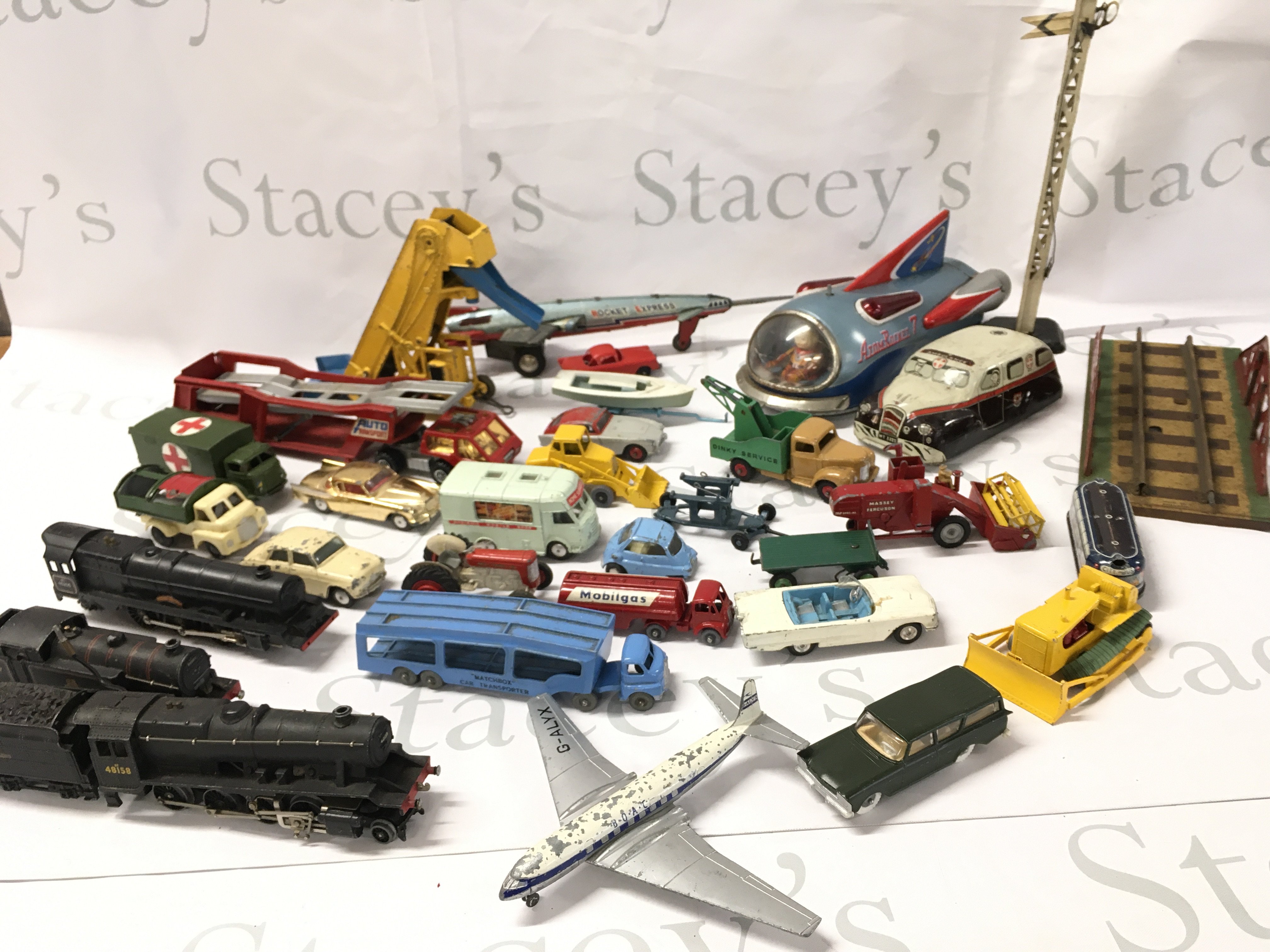 A Collection of Playworn Diecast And Tinplate. Includes Corgi. Dinky Also 3 00 Gauge Locos.