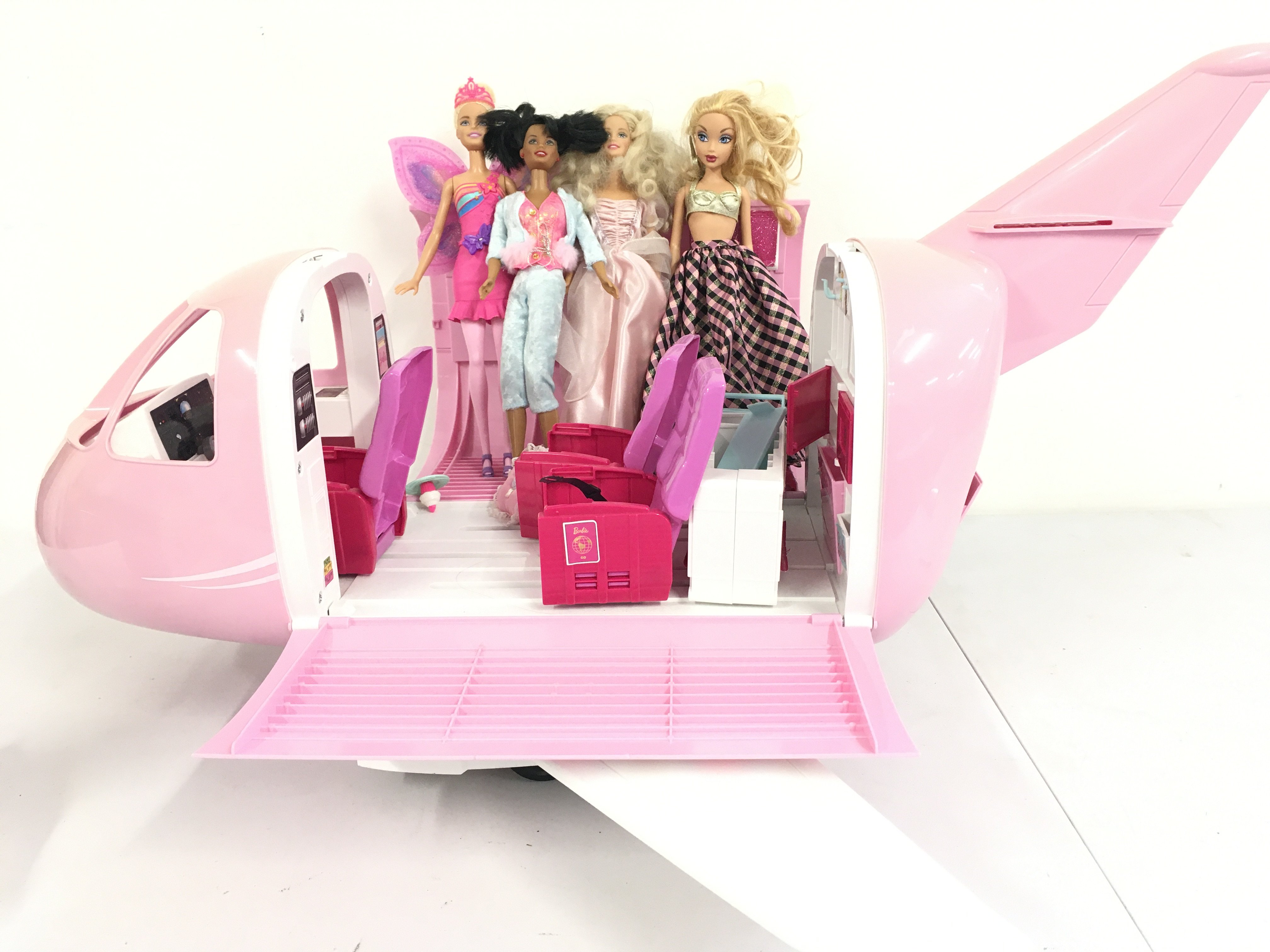 A Barbie Dream Plane (Parts Missing) And 4 Dolls. No Reserve.