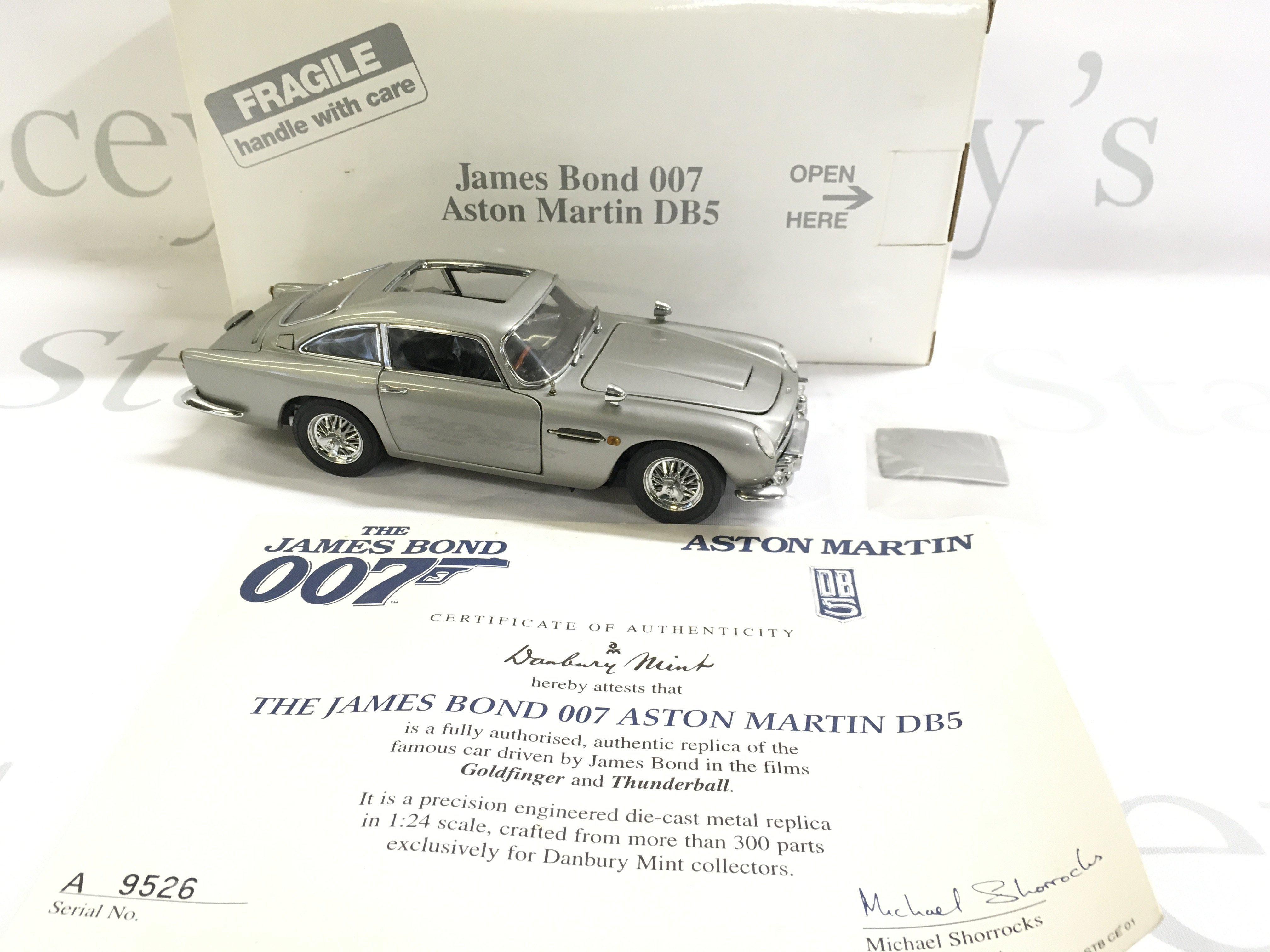 A Boxed Danbury Mint James Bond Aston Martin DB5.