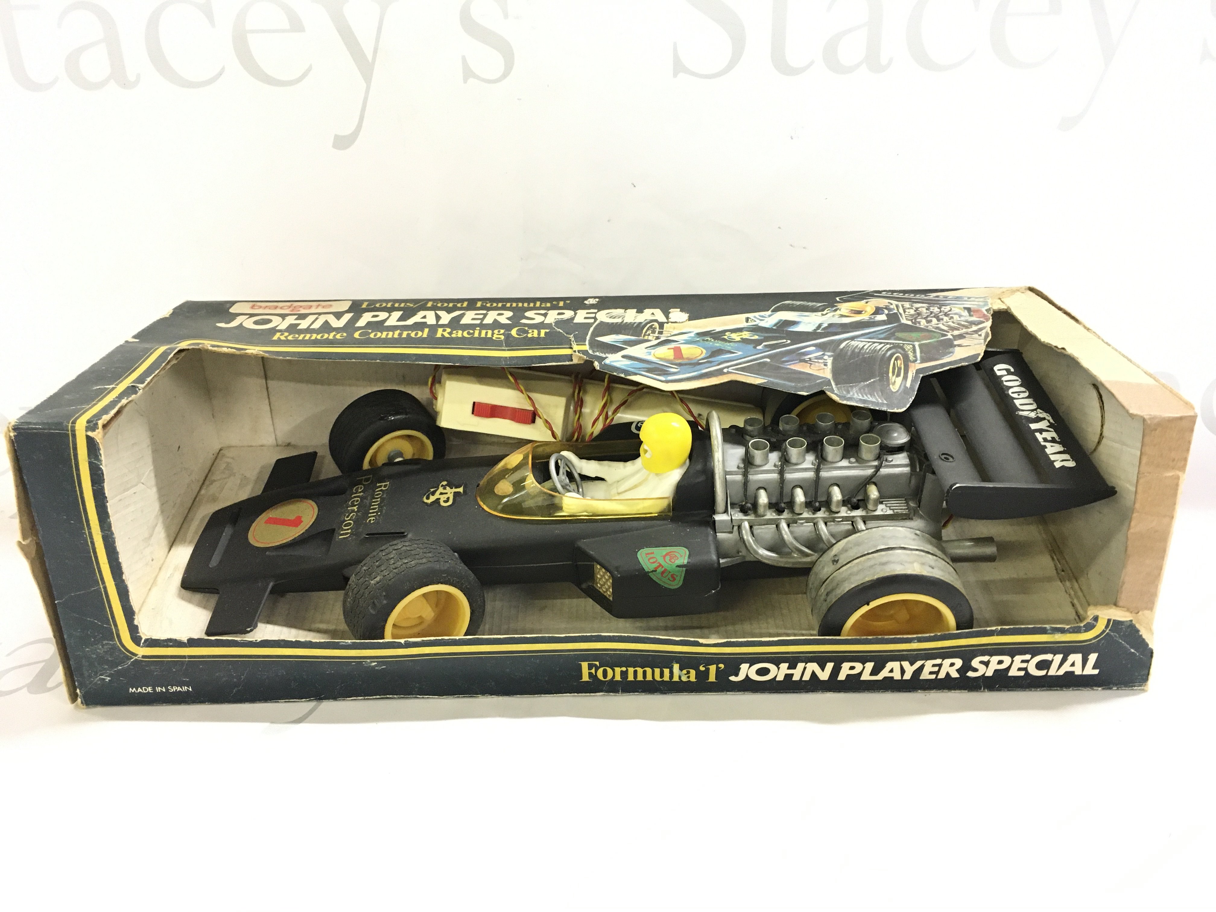 A Boxed Bradgate Lotus/Ford Formula 1 John Player Special Remote Control Racing Car. Box Is worn.