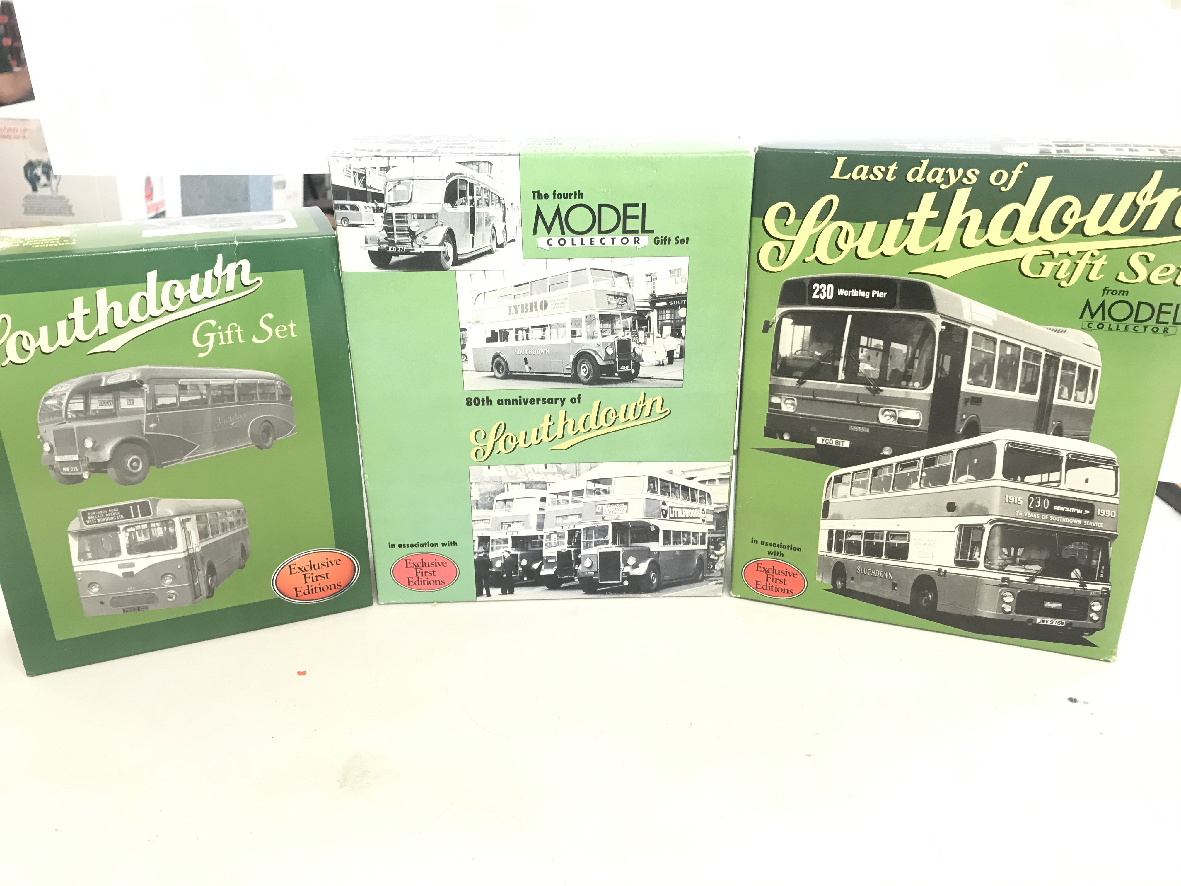 A box containing a collection of Southdown busses. Including Britbus models.