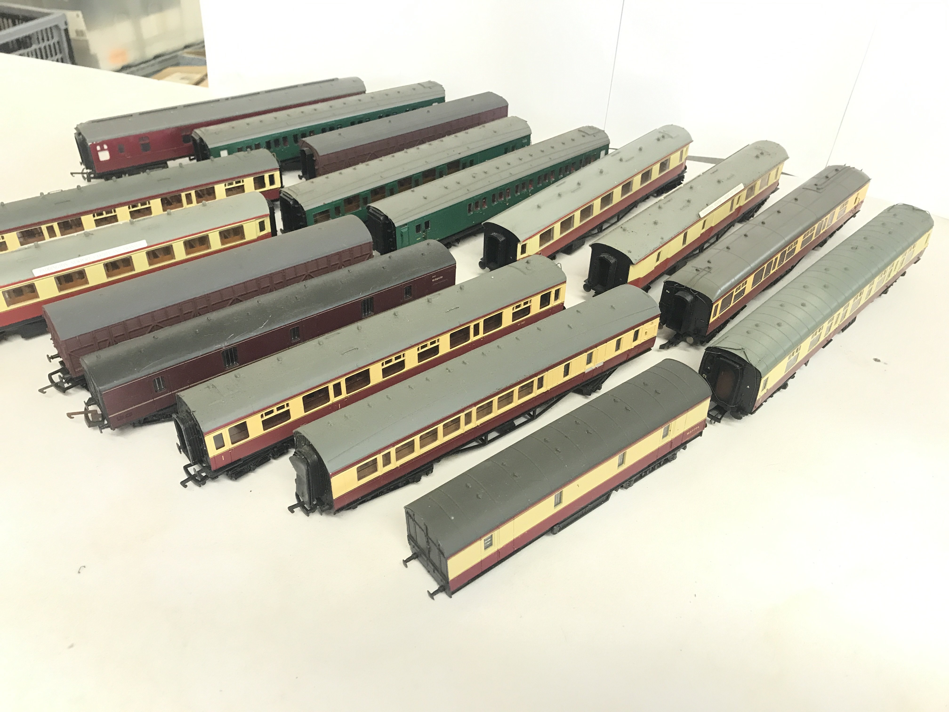A box containing a large quantity of 00 gauge coaches.including Lima and Mainline.