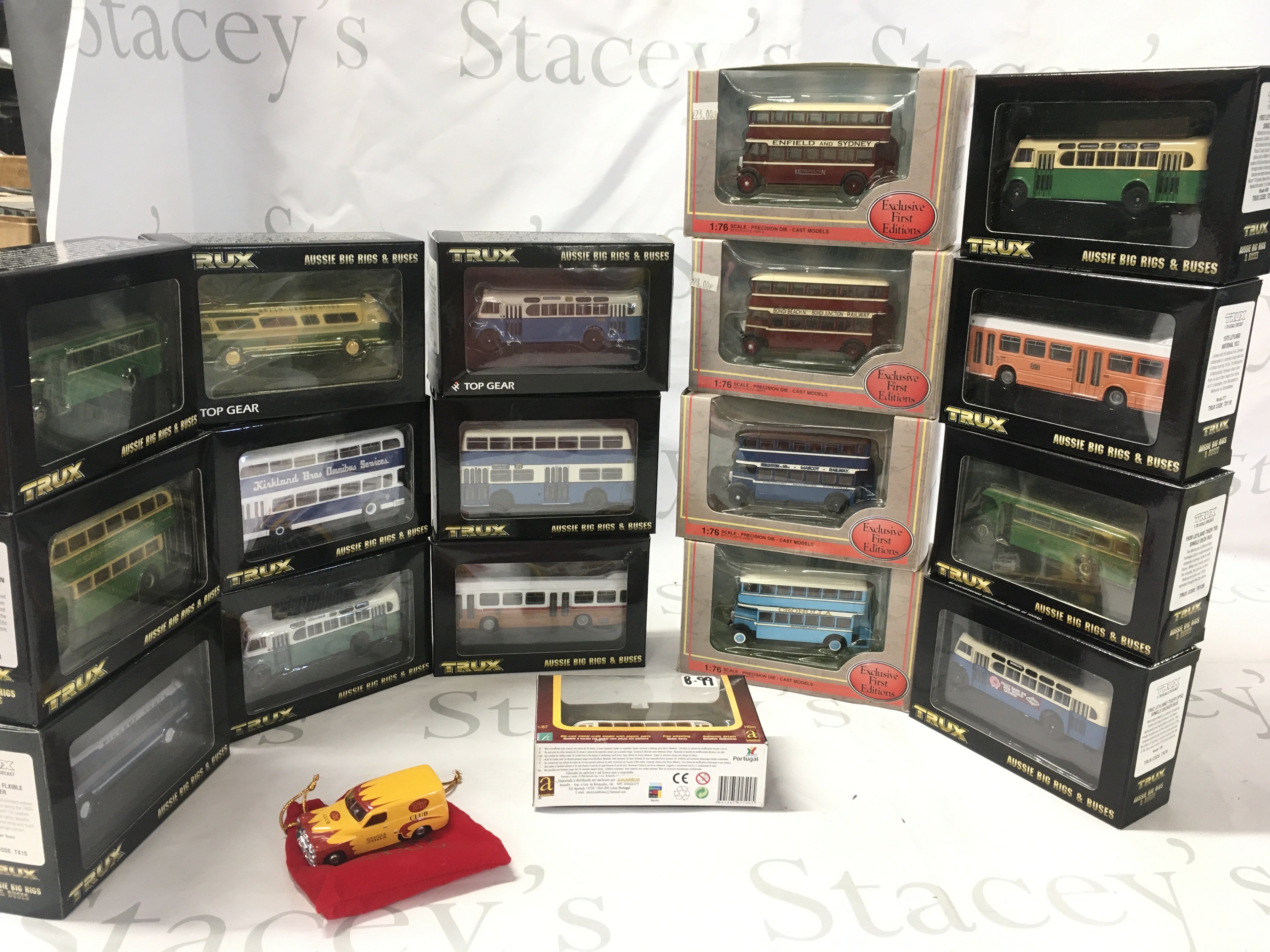 A collection of boxed diecast model buses by Trux and EFE. No reserve