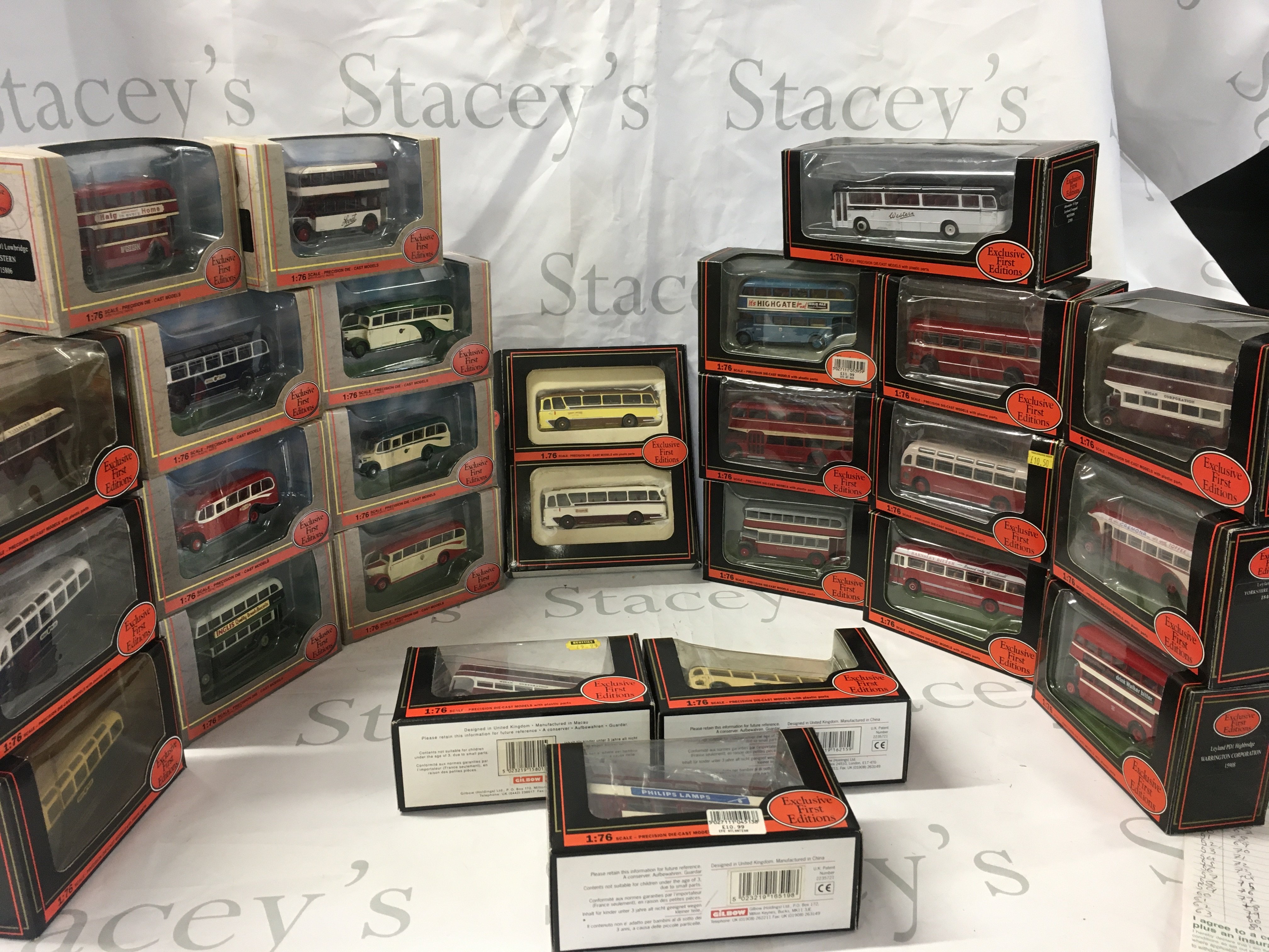A collection of boxed diecast model buses by EFE. No reserve