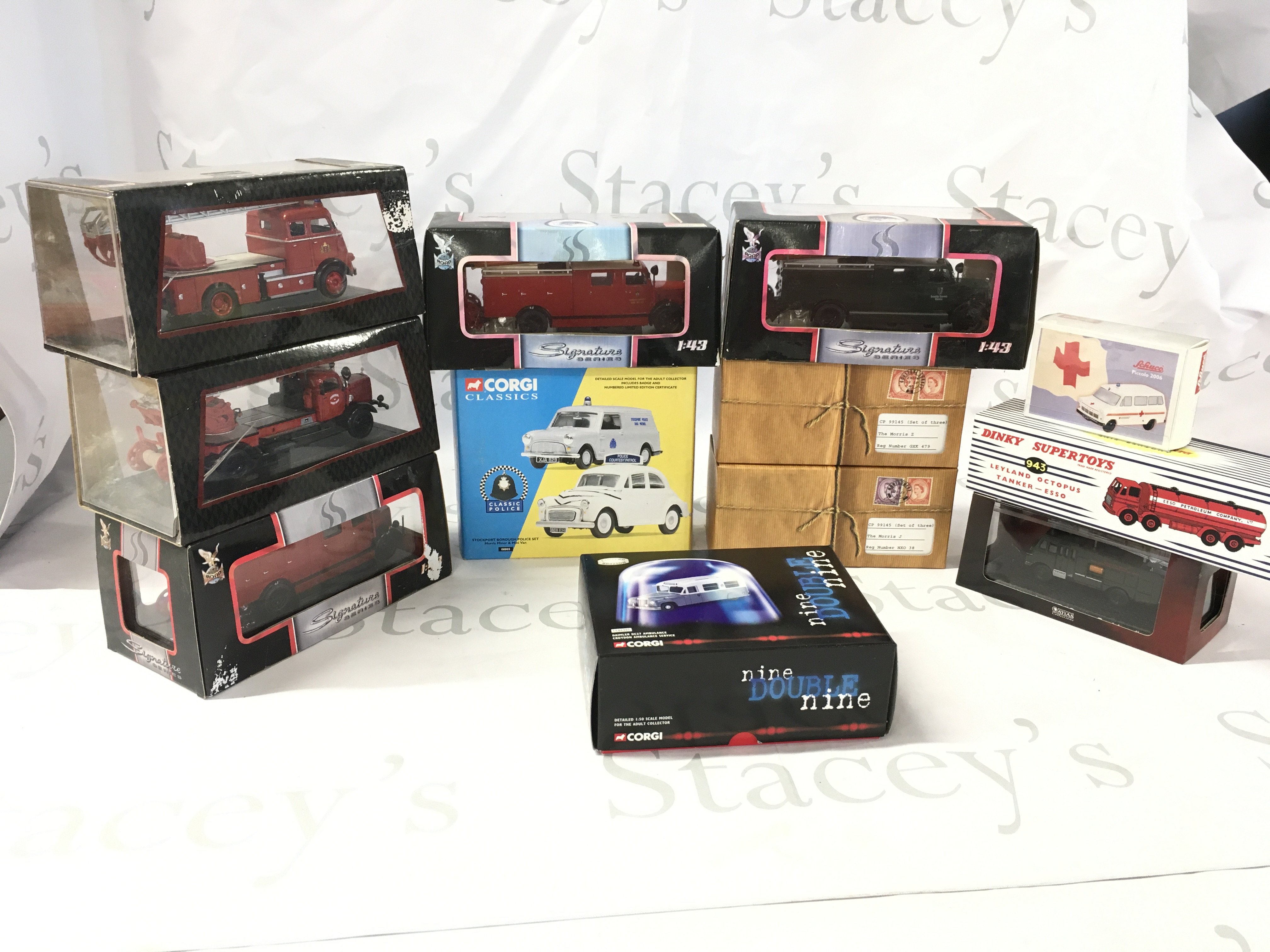 A collection of boxed emergency services diecast vehicles. Manufacturers include Corgi..ROAD..Dinky etc. No reserve