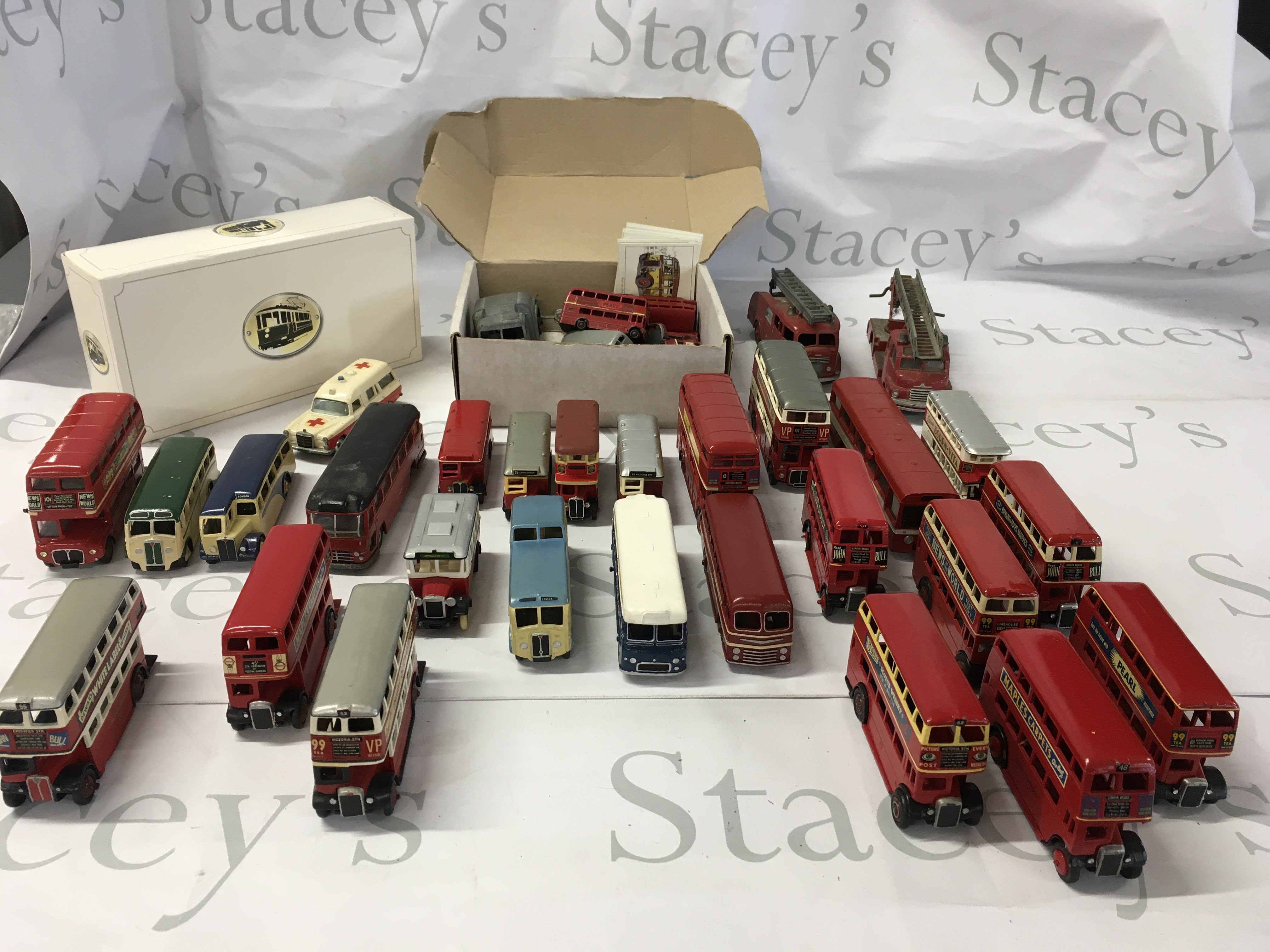 A collection of Playworn diecast model vehicles mainly buses manufactured by Dinky..Lledo etc. no reserve.