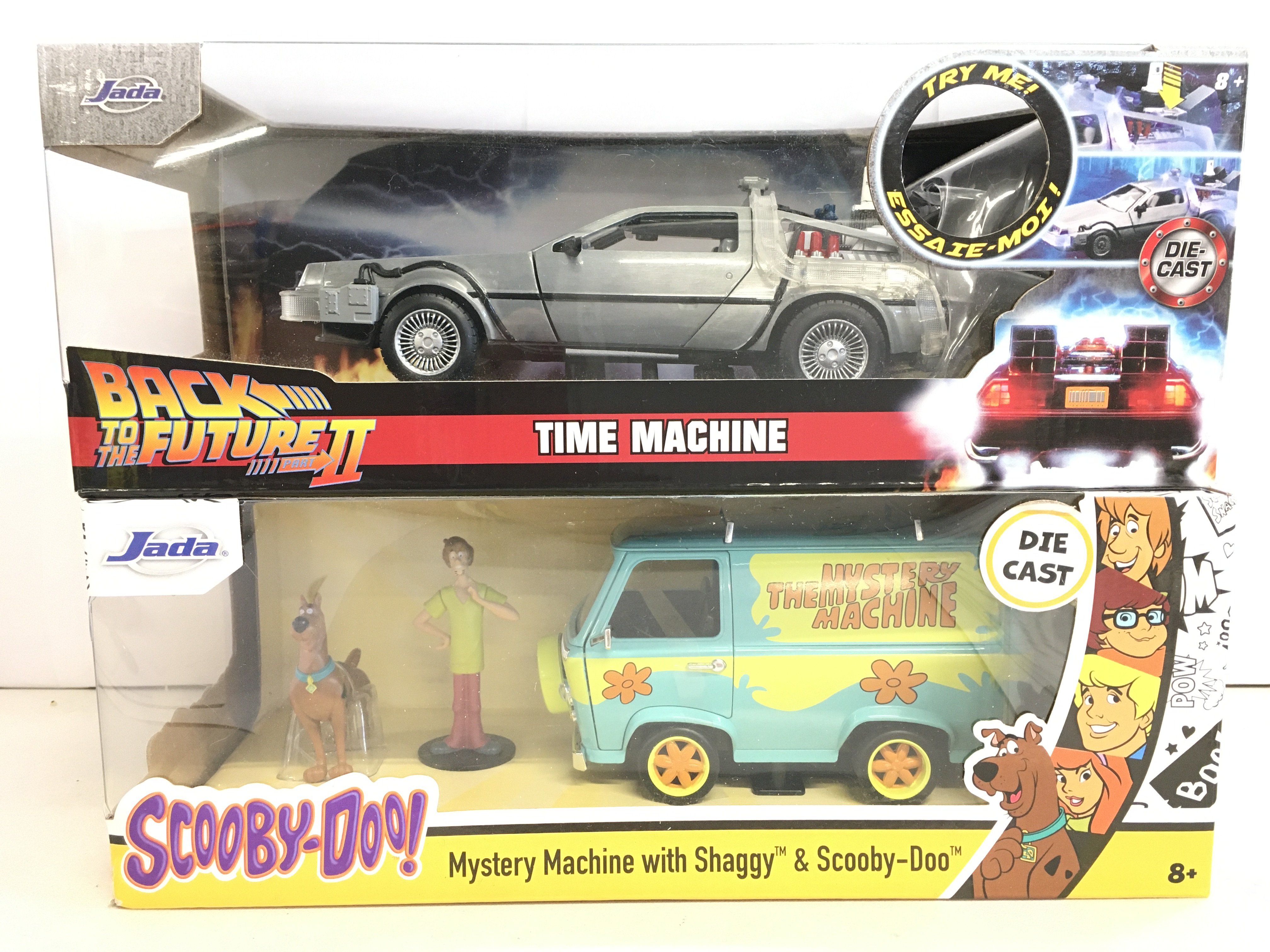 A Boxed Jade Mystery Machine With Shaggy and Scooby-Doo And A Boxk To The Future 2 Time Machine.(2)