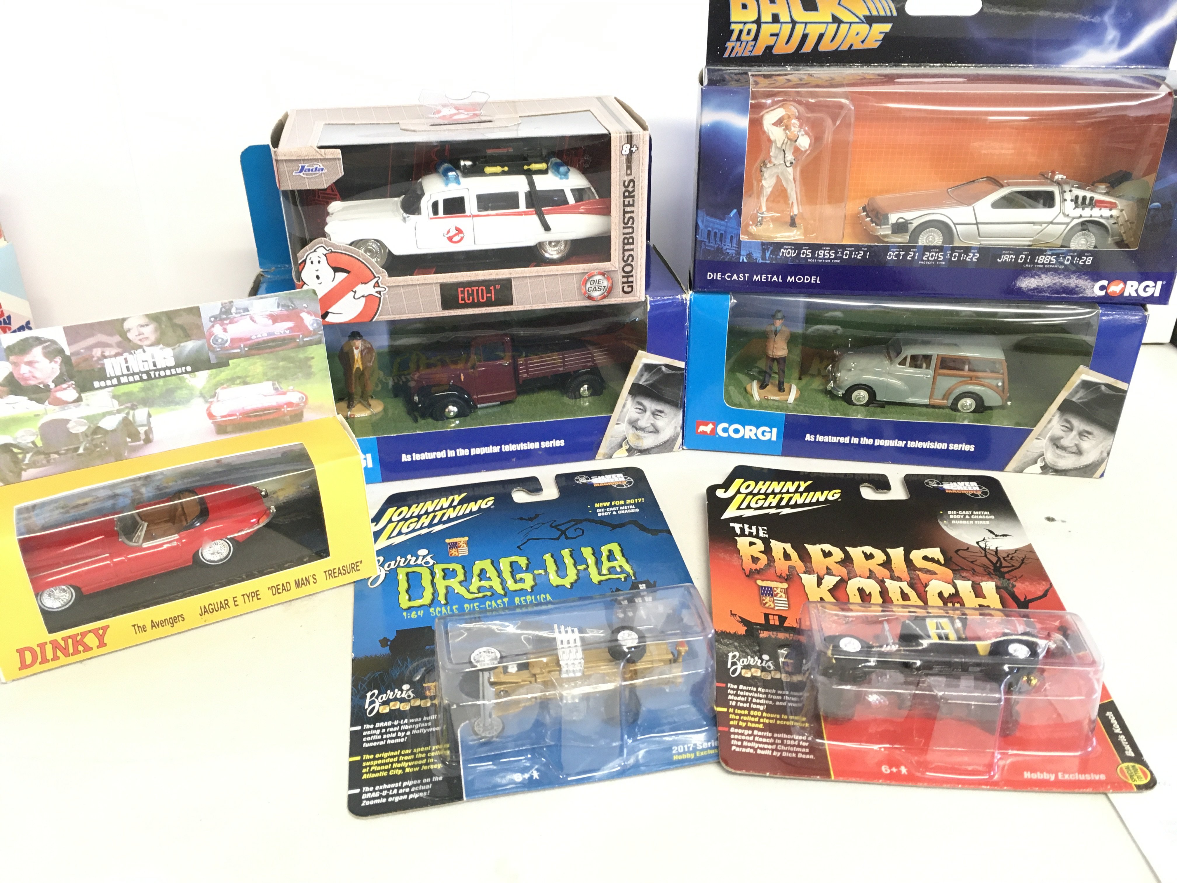 A Collection of Boxed Diecast Including Back To The Future. Heartbeat. Ghostbusters Etc. (Dinky Car is In A Custom Made Box).
