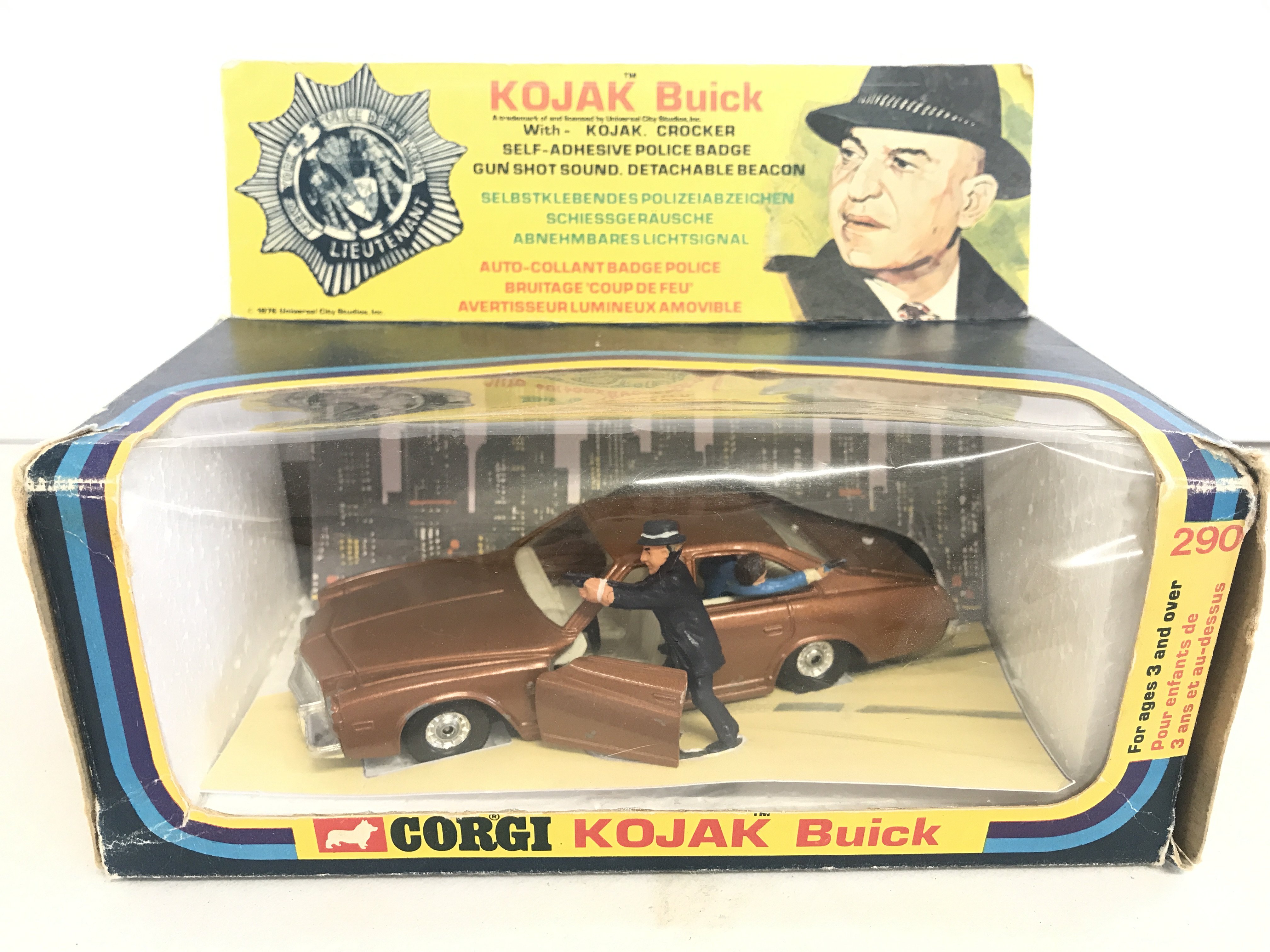 A Boxed Corgi Kojak Buick #290 With Repro Badge And Inserts.