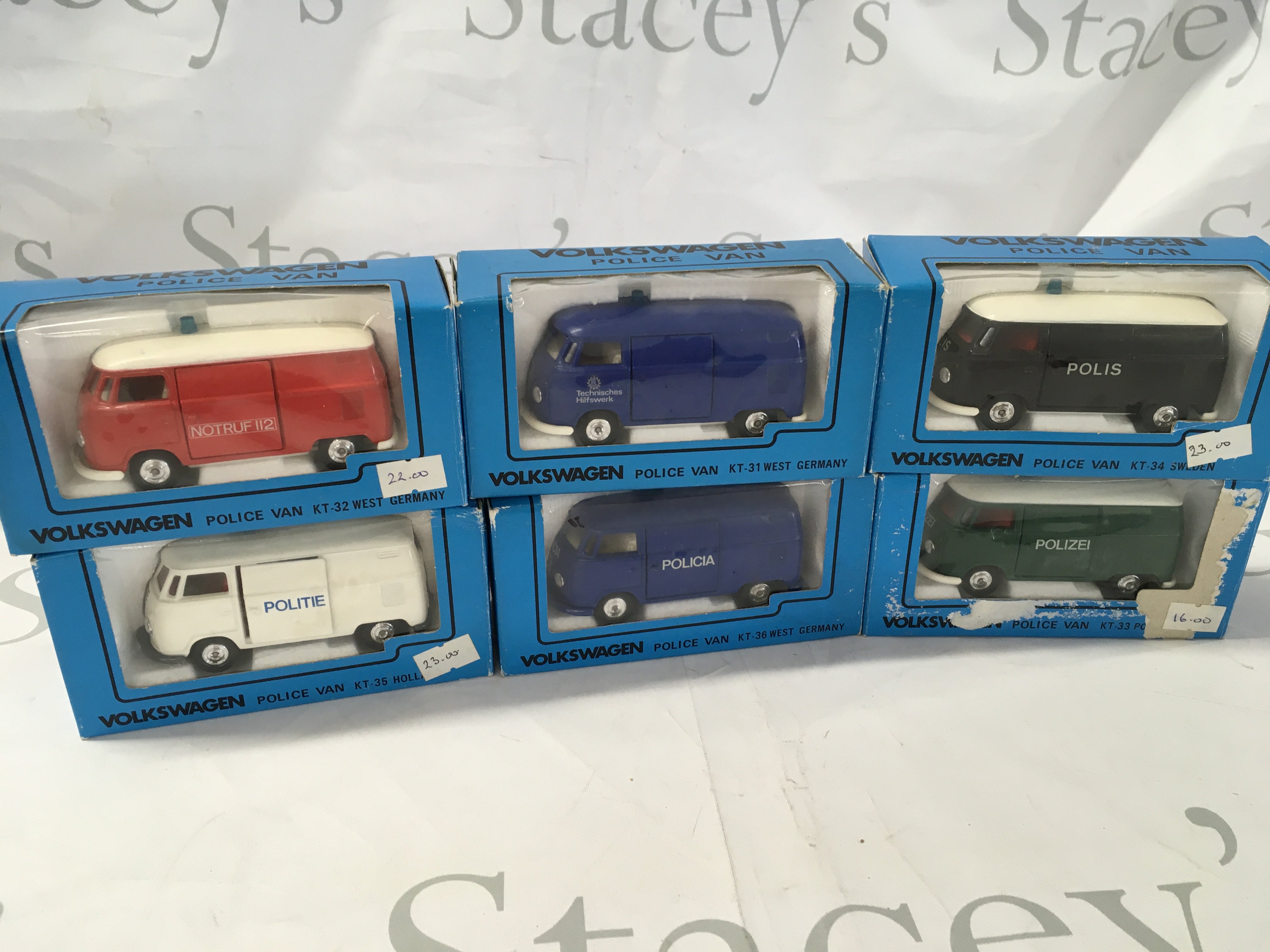 A collection of 6 boxed diecast model Volkswagen cars in police livery. Manufacturer Caddo. No reserve.